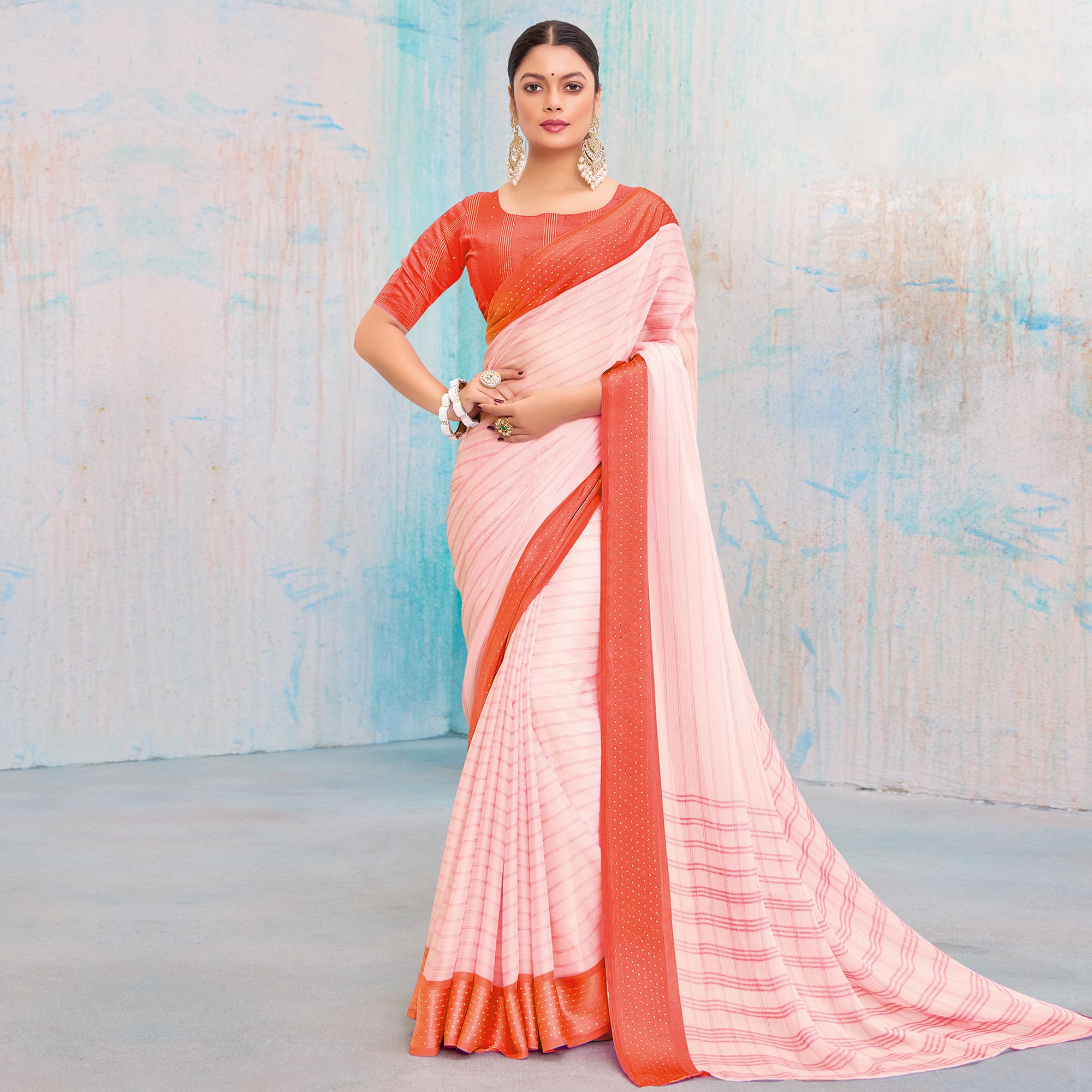 Coral Orange Printed Chiffon Saree With Weaving Border