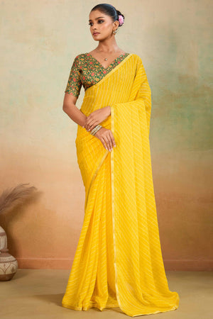 Yellow Leheriya Chiffon Saree Accented With Elegant Zari Lace Border Work
