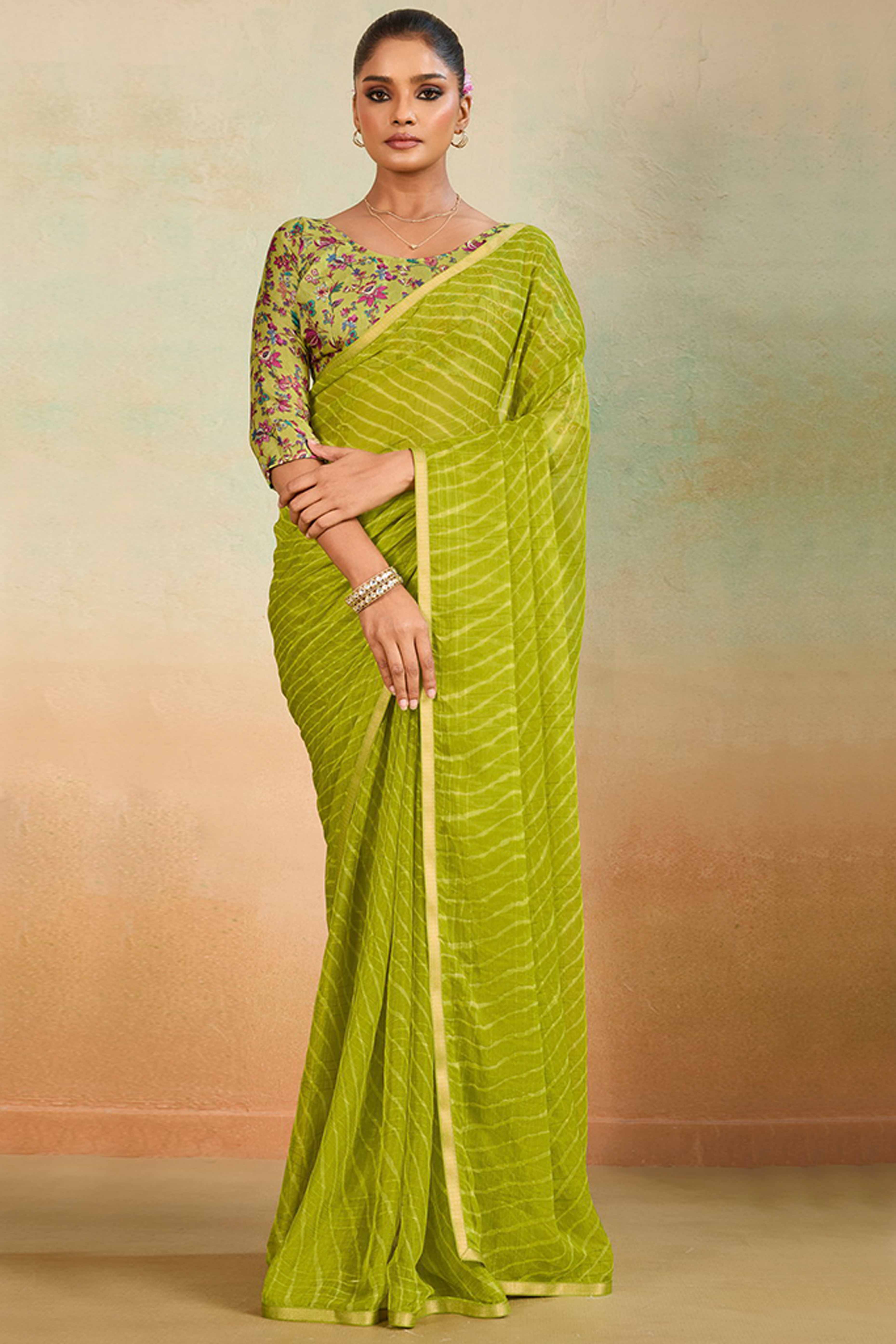 Green Leheriya Chiffon Saree Accented With Elegant Zari Lace Border Work