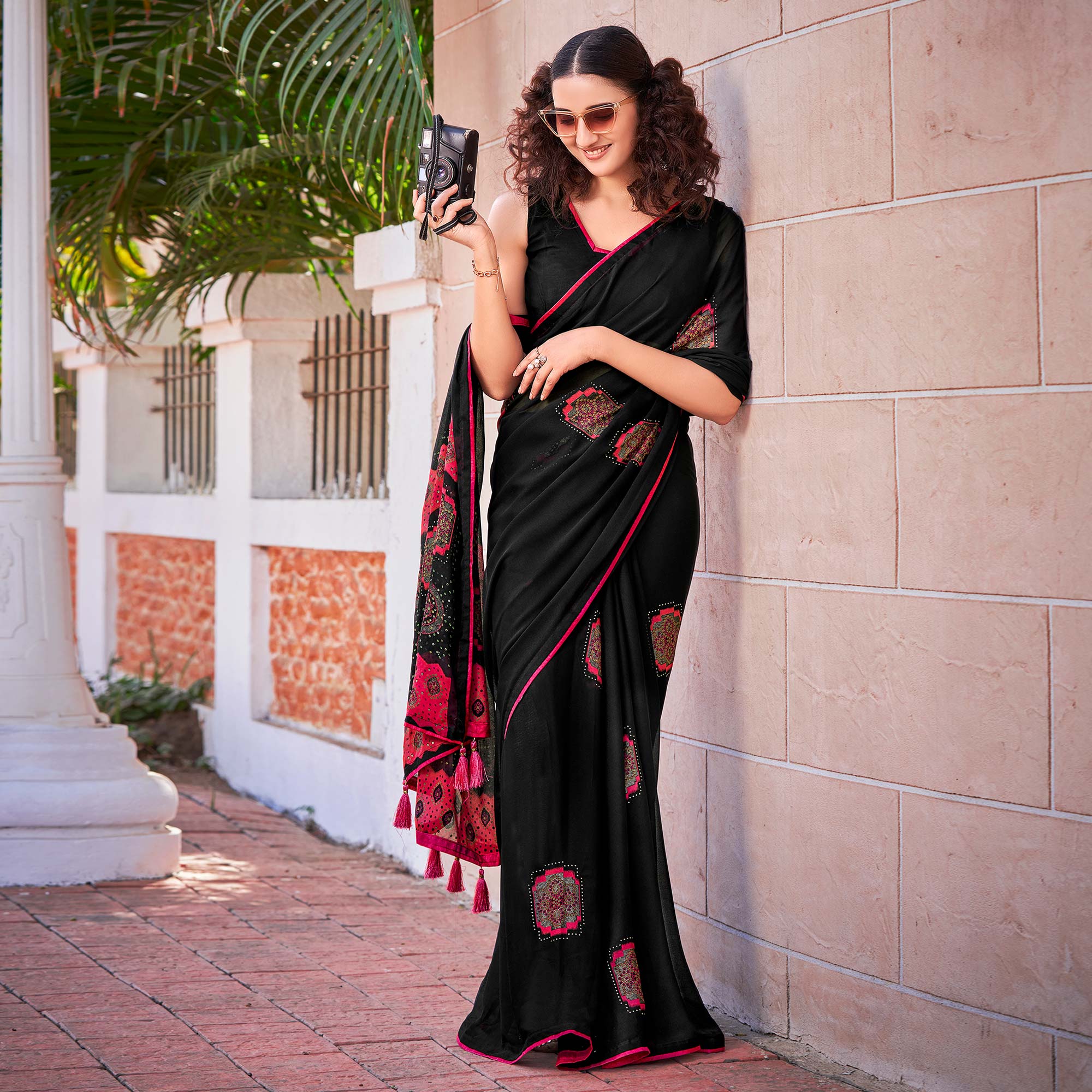 Black Foil Printed Georgette Saree With Tassels