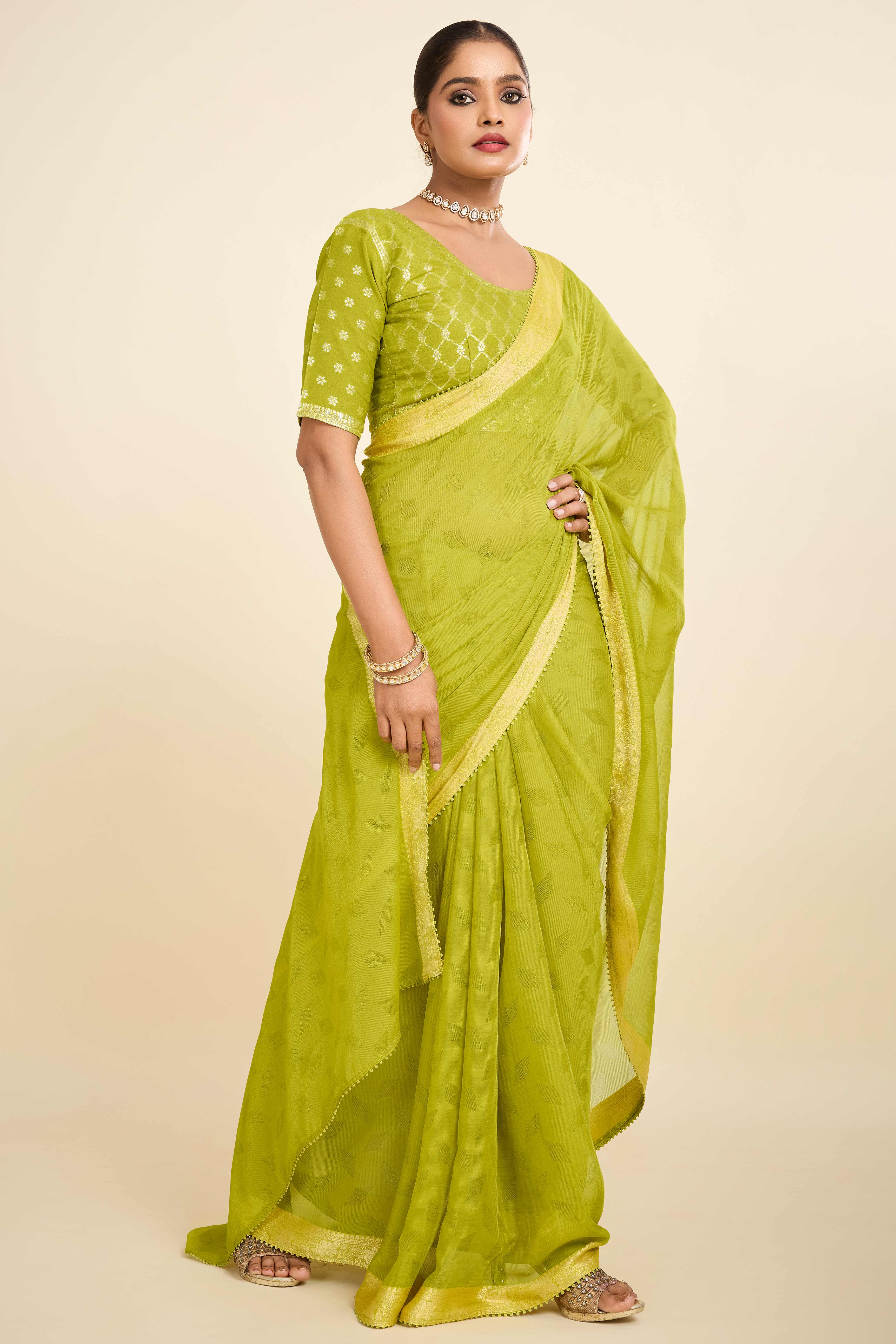 Parrot Green Printed Chiffon Saree with Intricate Woven Edging