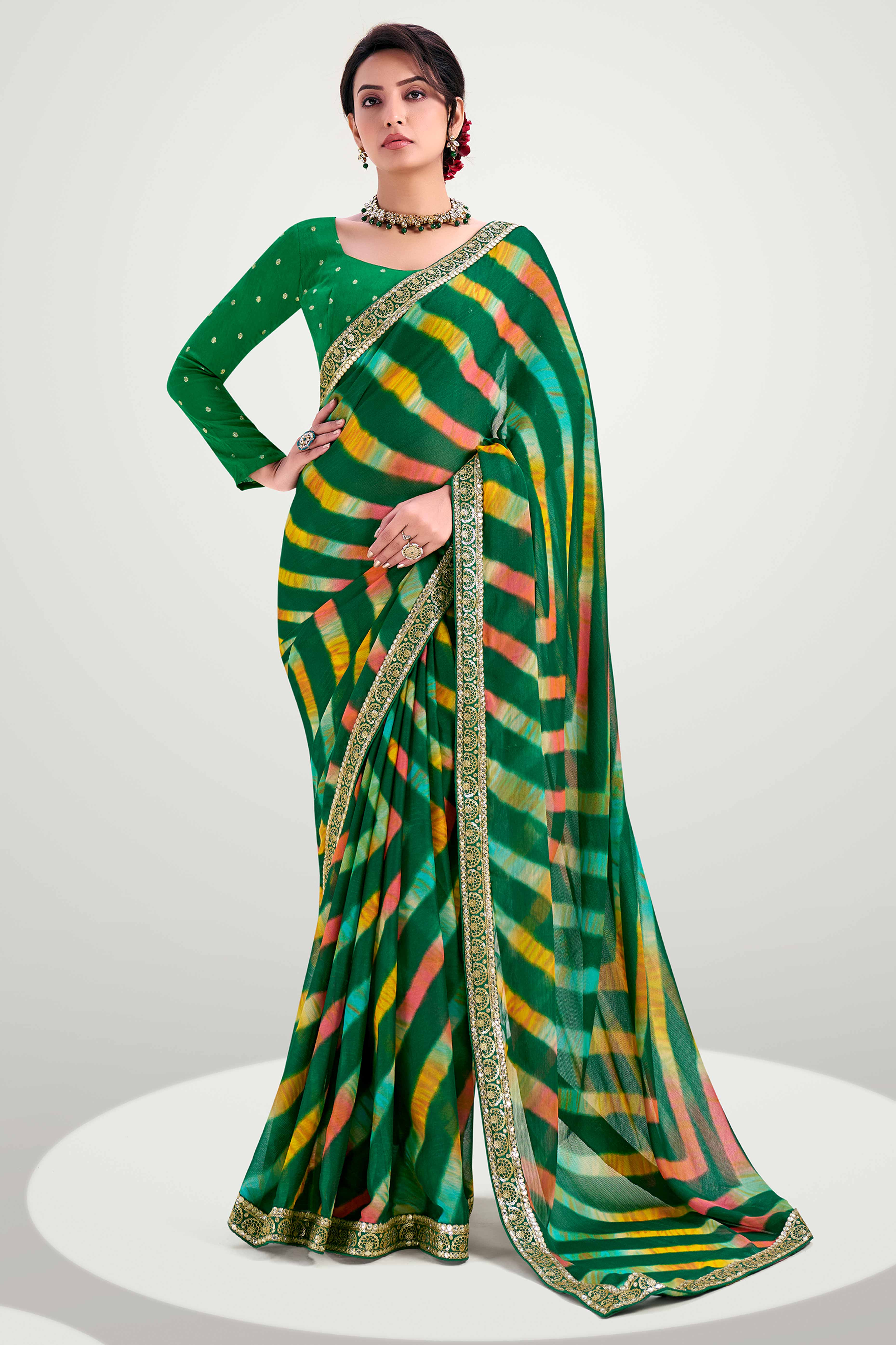 Green Striped Printed Chiffon Saree Enhanced With Sparkling Sequins Embroidered Border Work