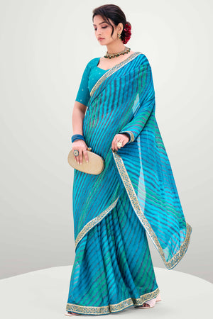 Blue Striped Printed Chiffon Saree Enhanced With Sparkling Sequins Embroidered Border Work