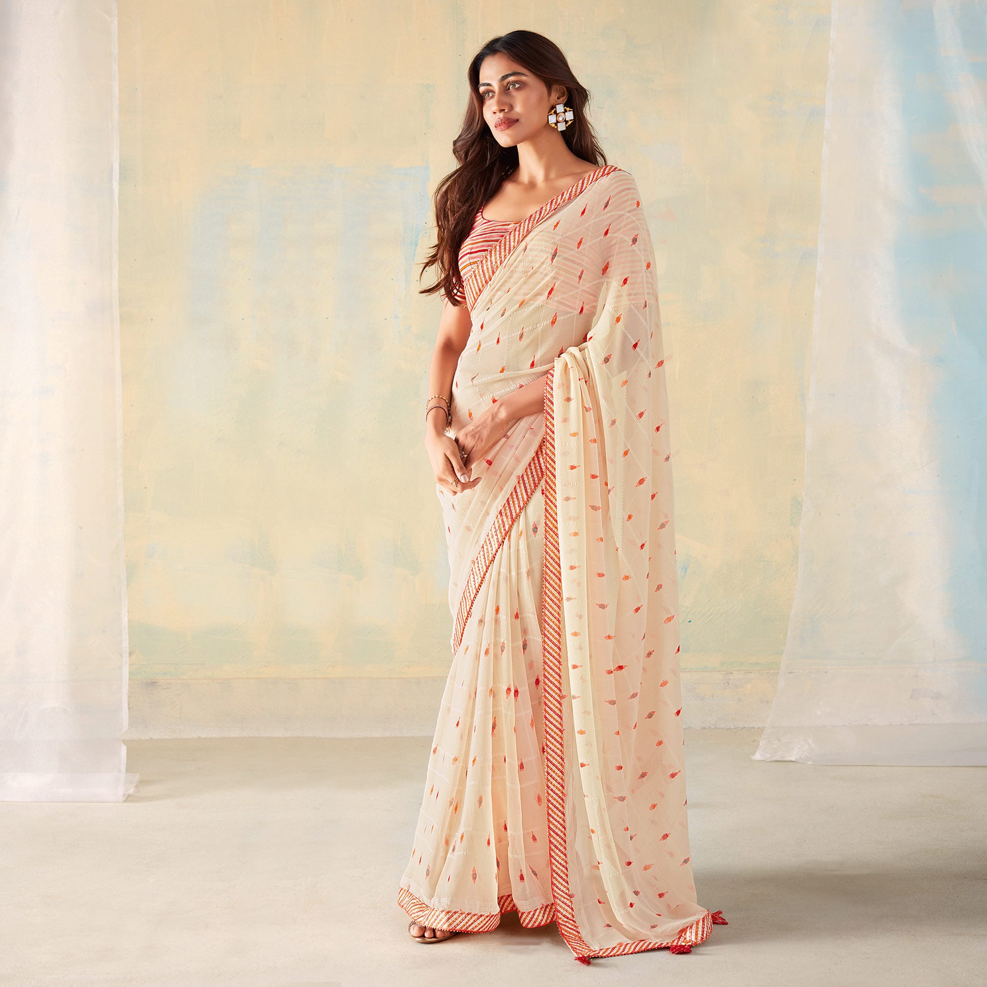 Off White Printed With Gota Patti Border Georgette Saree With Tassels