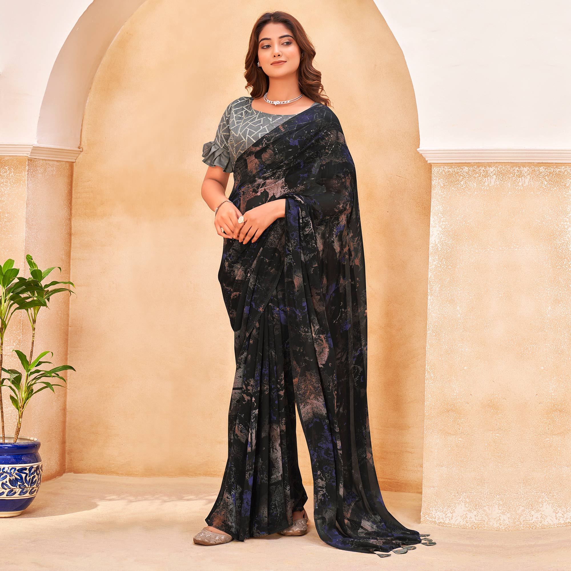 Black  Floral Printed Georgette Saree With Tassels