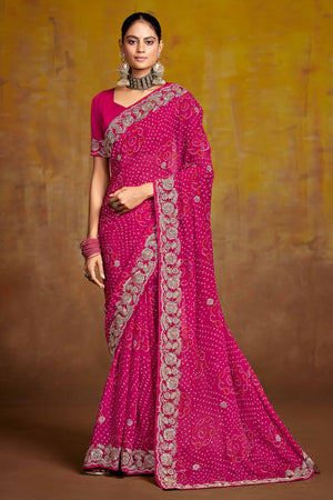 Pink Georgette Saree Adorned With Traditional Bandhani Prints & Intricate Floral Embroidery