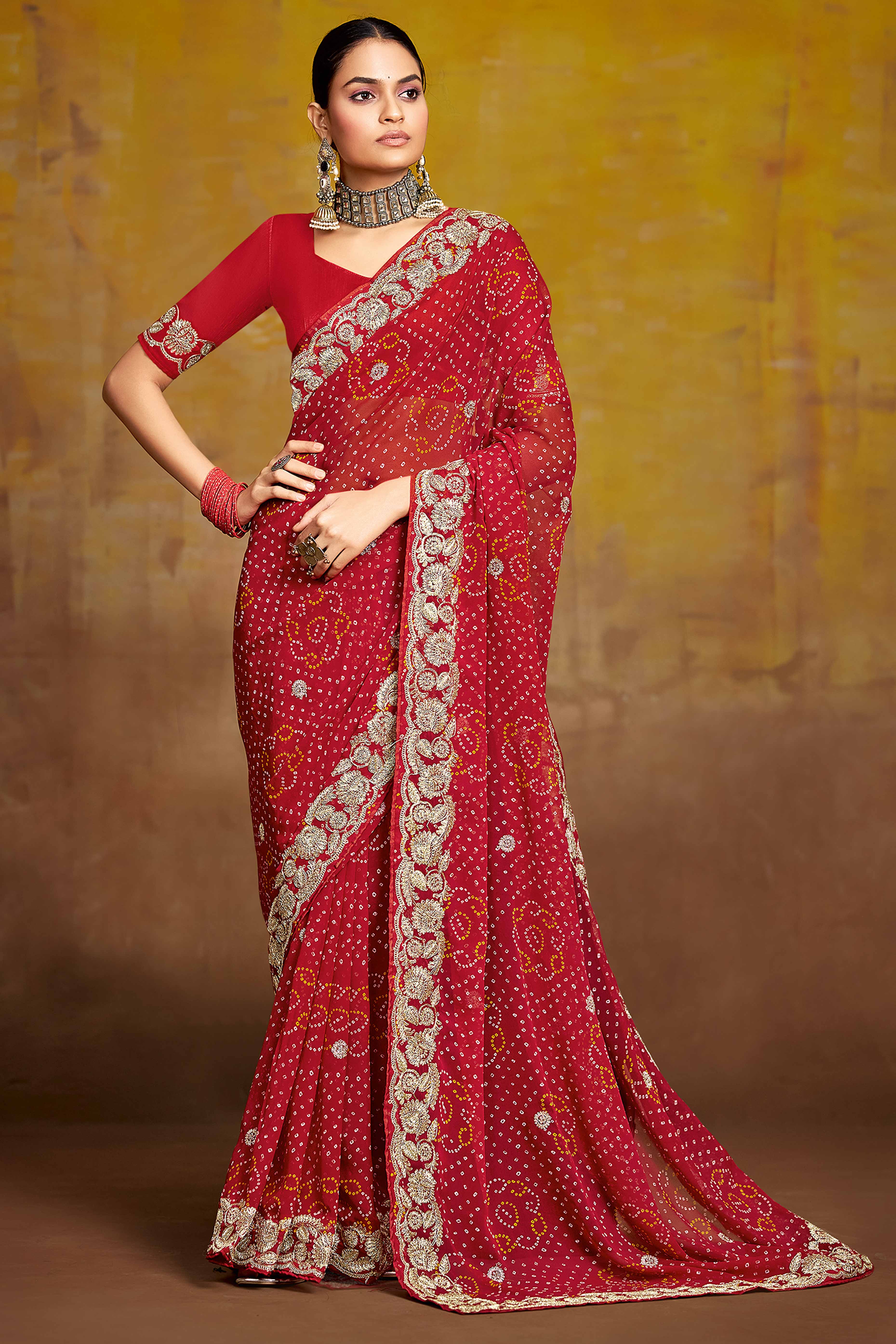 Maroon Georgette Saree Adorned With Traditional Bandhani Prints & Intricate Floral Embroidery