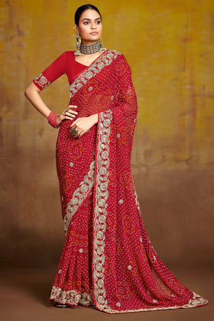 Maroon Georgette Saree Adorned With Traditional Bandhani Prints & Intricate Floral Embroidery