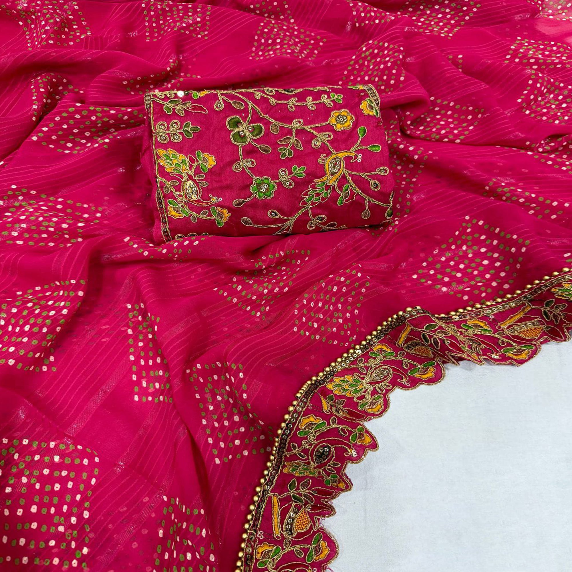 Pink Bandhani Printed Georgette Saree for Festive Wear with Lace Border