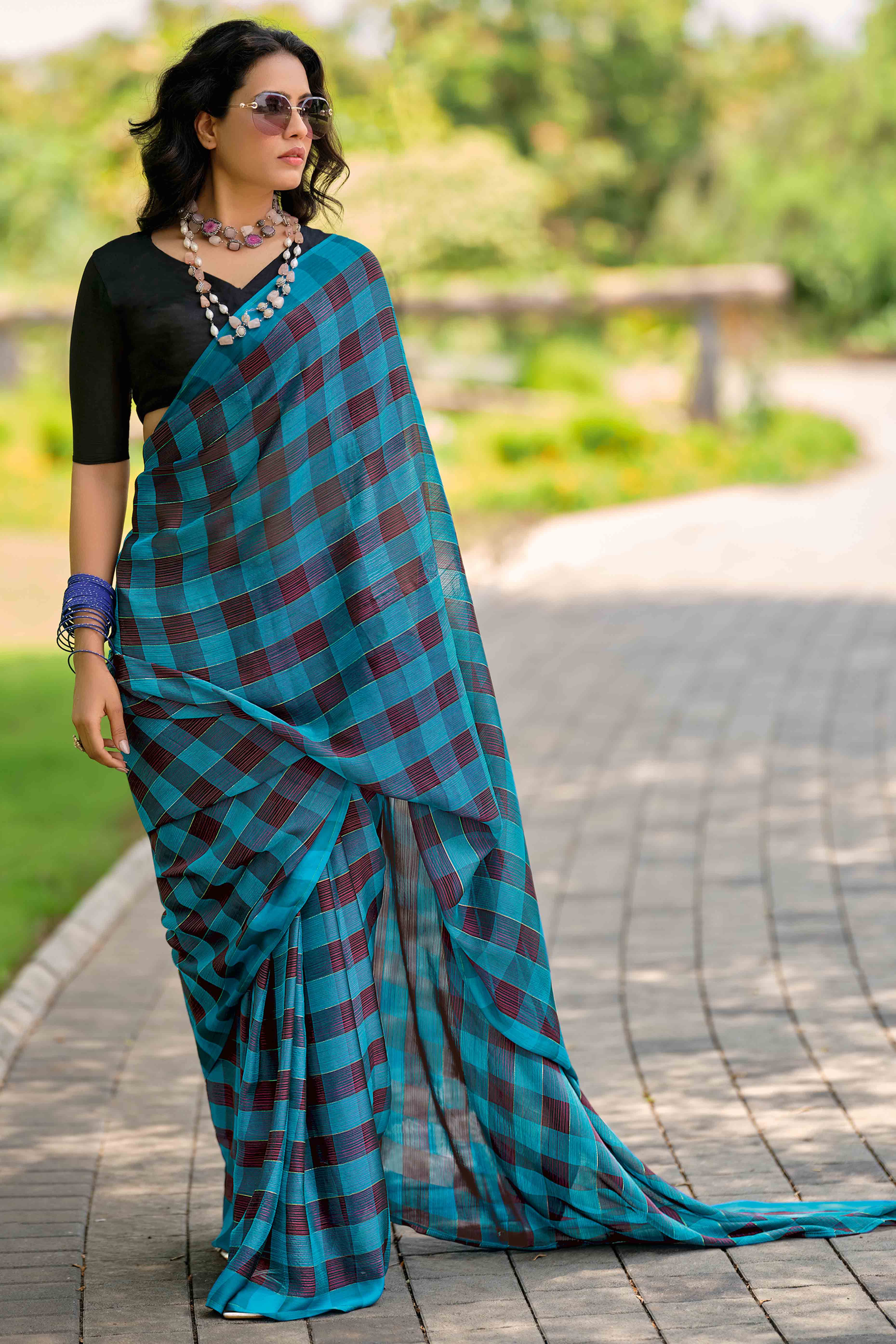 Sky Blue With Intricate Black Weaving Checks Georgette Saree