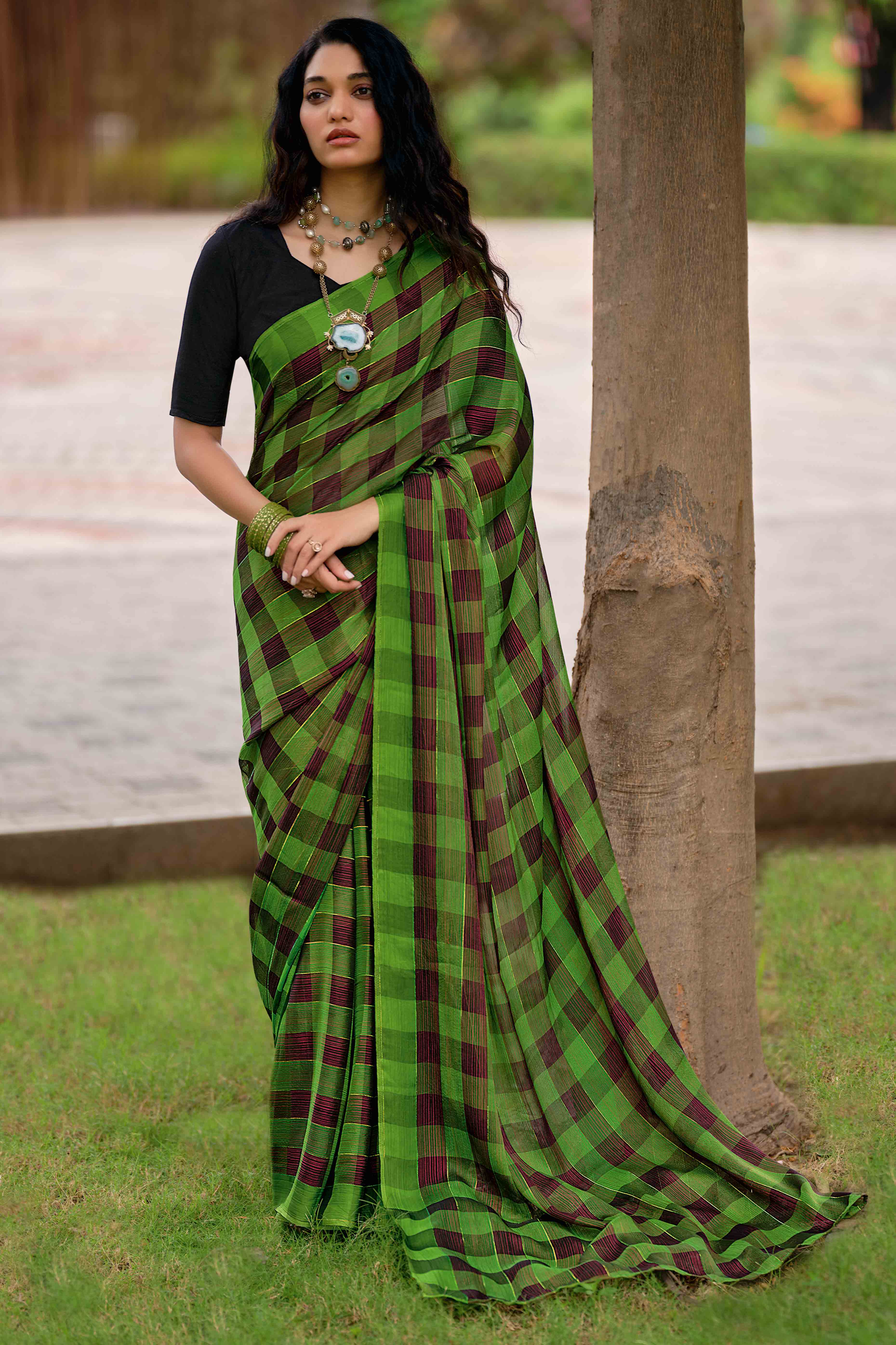 Green With Intricate Black Weaving Checks Georgette Saree