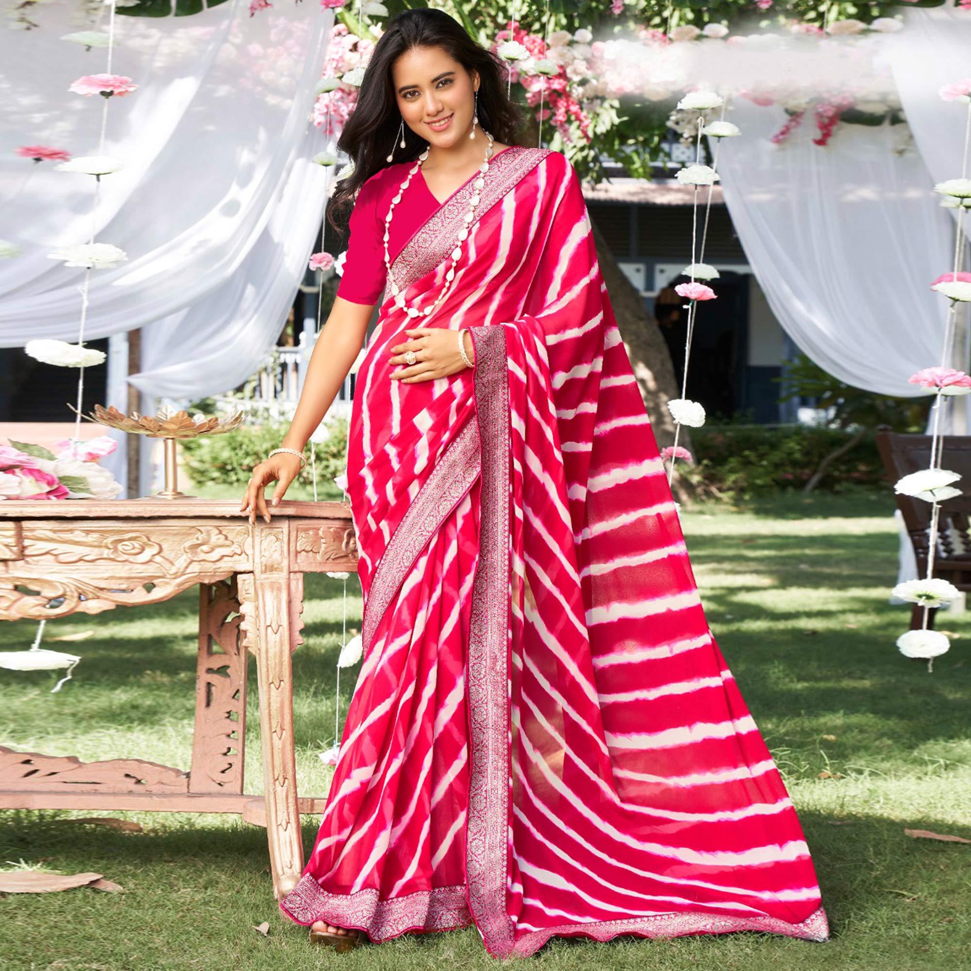 Pink Leheriya Printed With Woven Border Georgette Saree