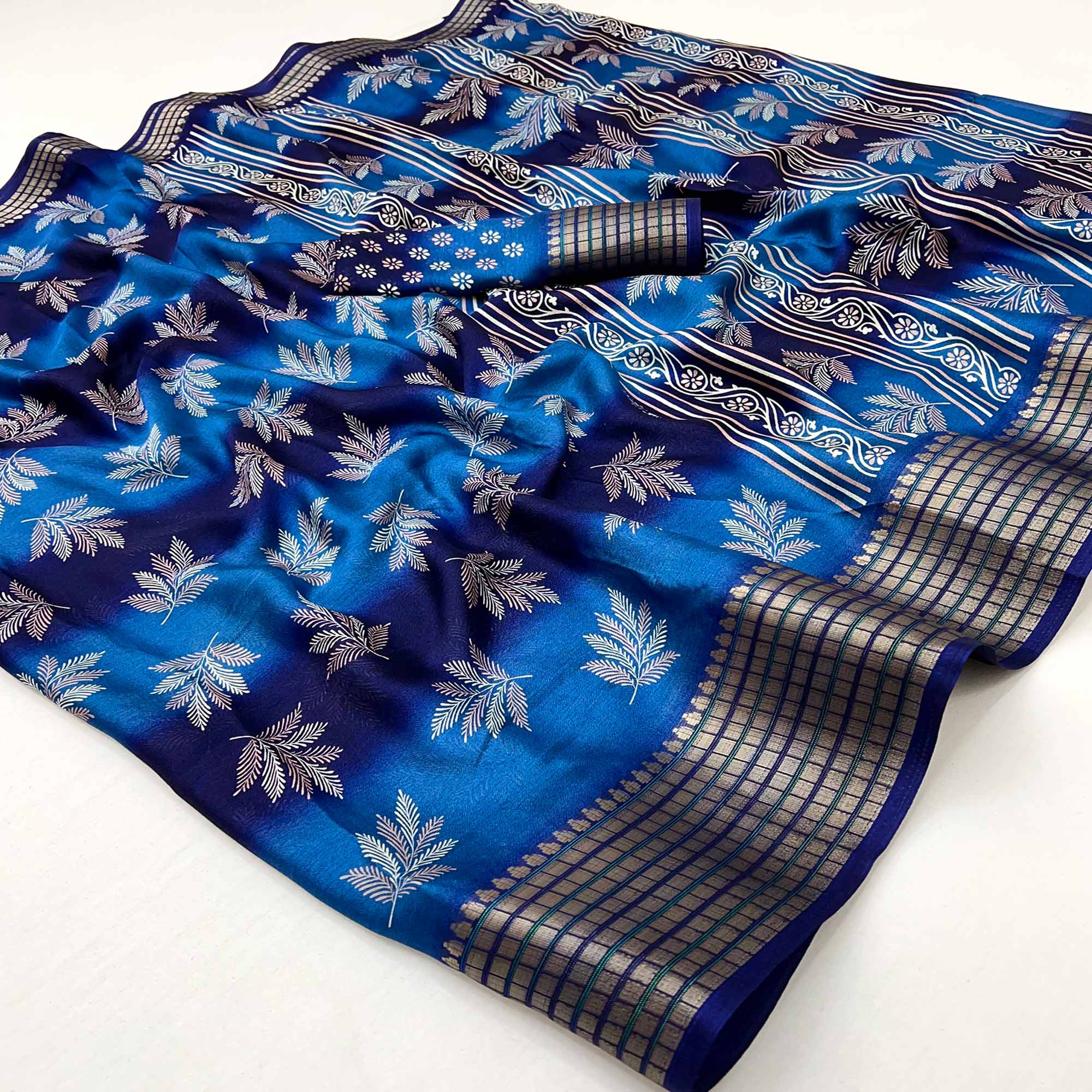 Blue Floral Printed Georgette Saree Featuring Weaving Border Design
