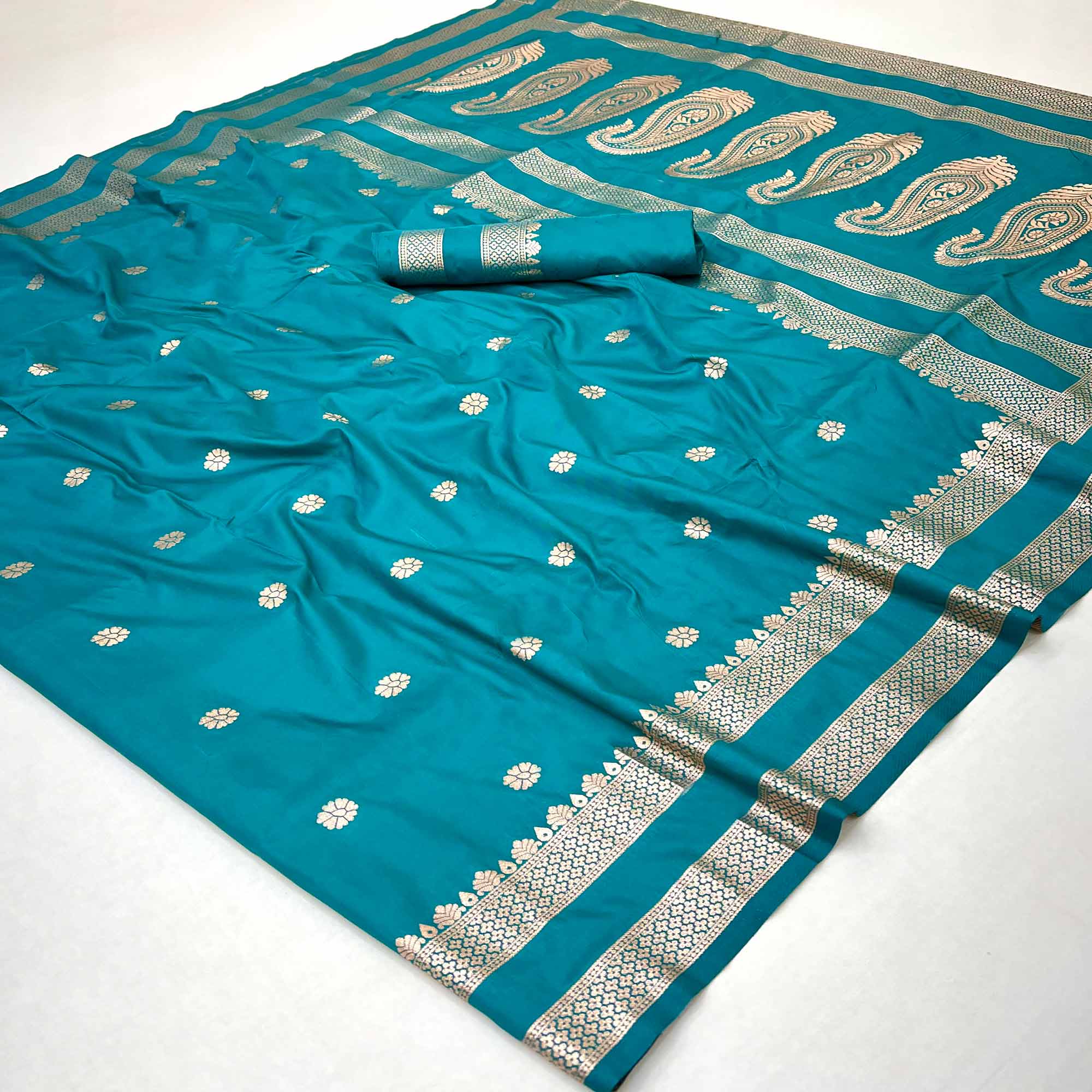 Rama Blue Ornate Floral Zari Weaving Work Silk Blend Saree With Festive Shine