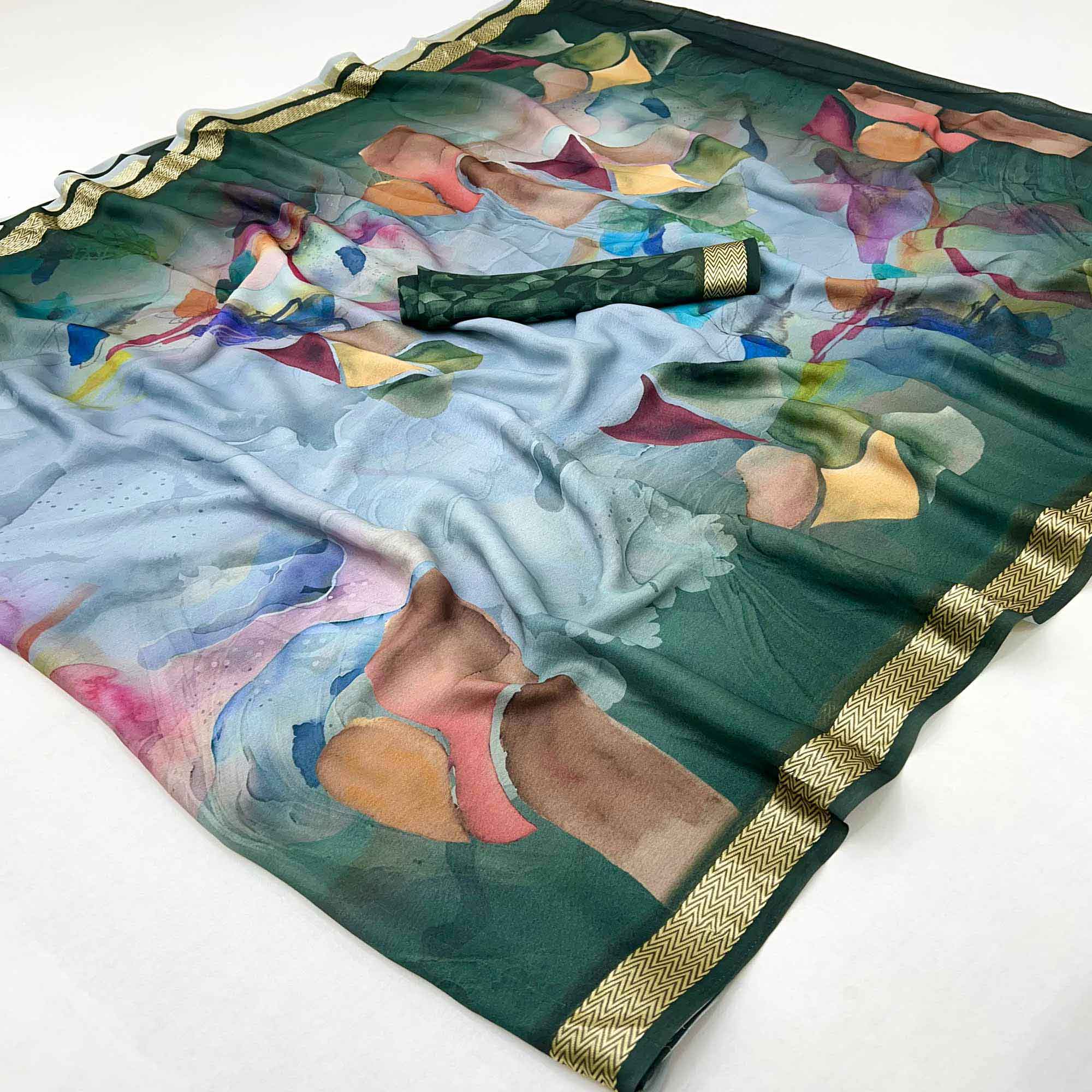 Graceful Dark Green Georgette Saree Accented With Digital Prints & Viscose Border Finish