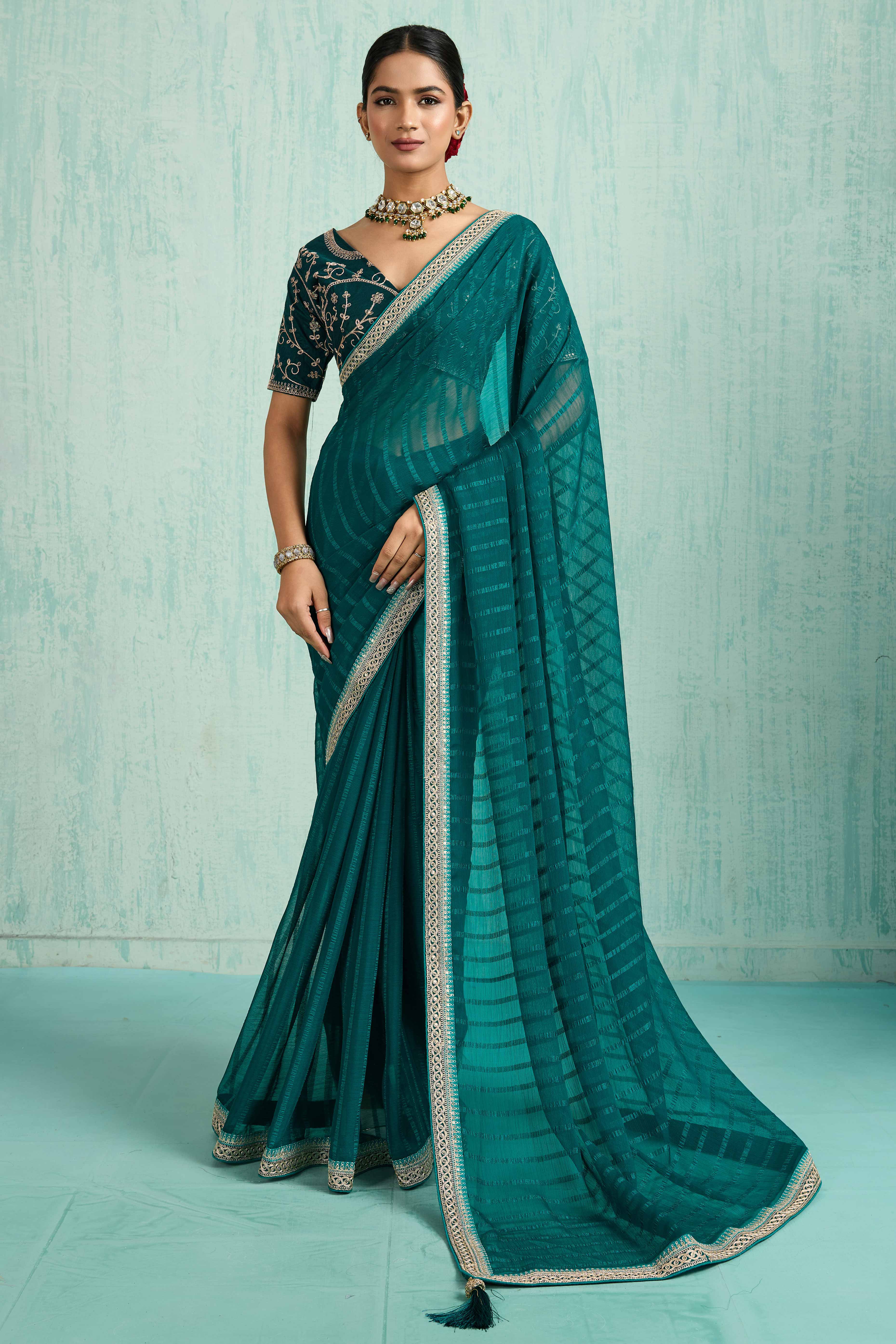 Teal Chiffon Saree With Elegant Stripes & Sequins Embroidered Border