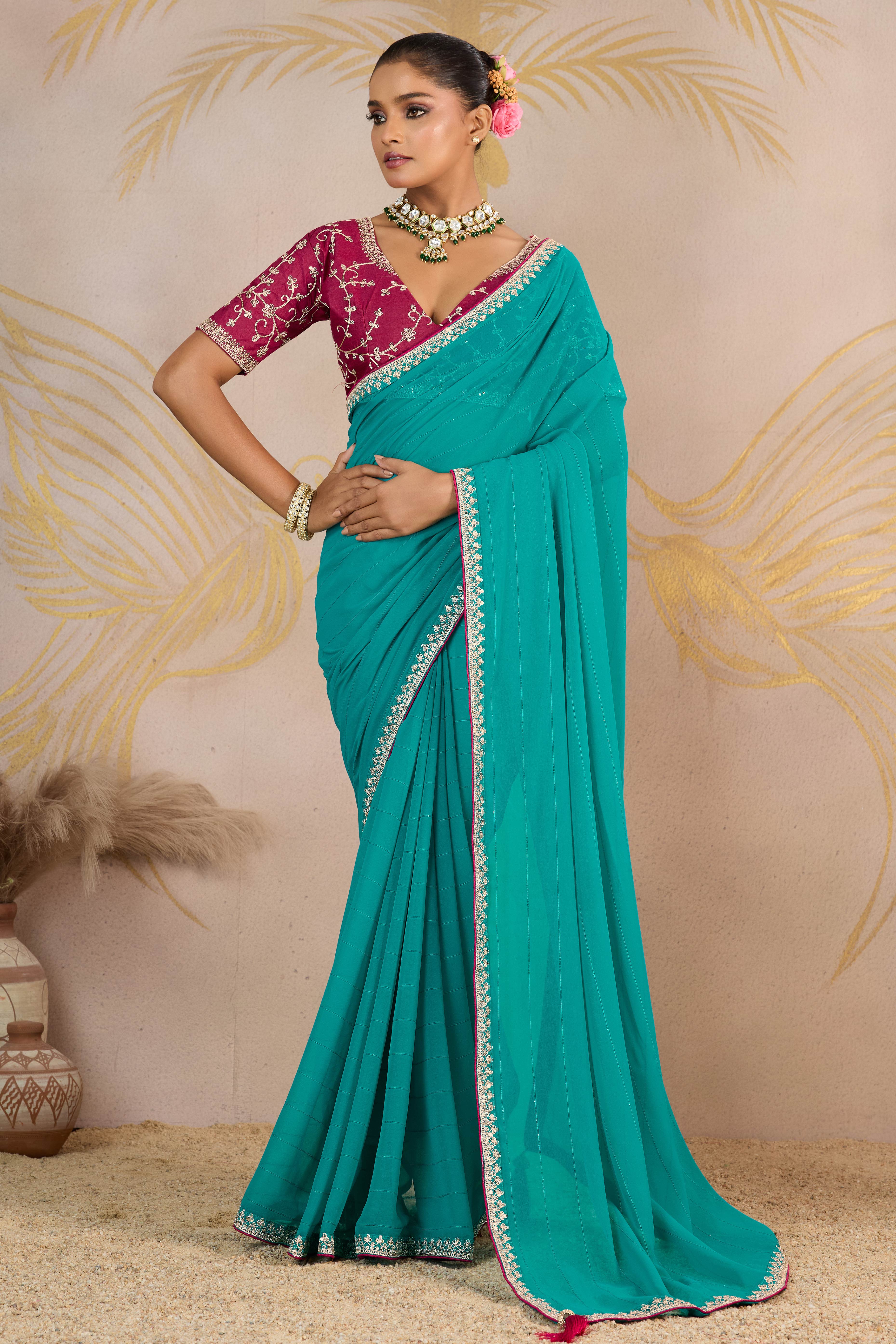 Sky Blue Zari Embroidered Georgette Saree Accented With Sequins