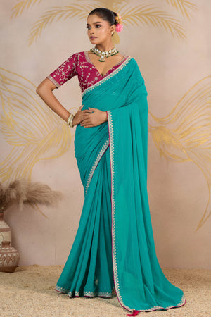Sky Blue Zari Embroidered Georgette Saree Accented With Sequins