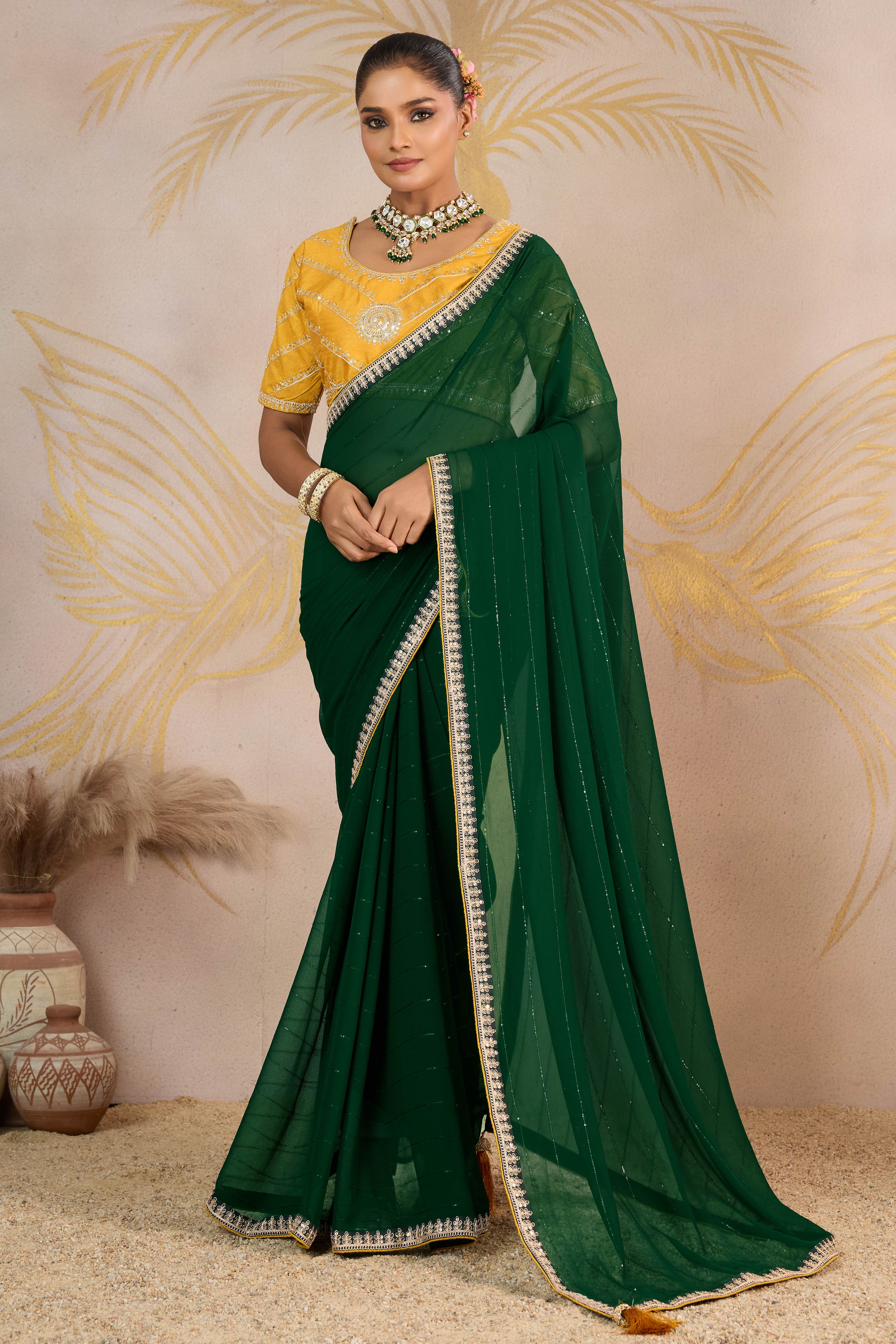 Green Zari Embroidered Georgette Saree Accented With Sequins