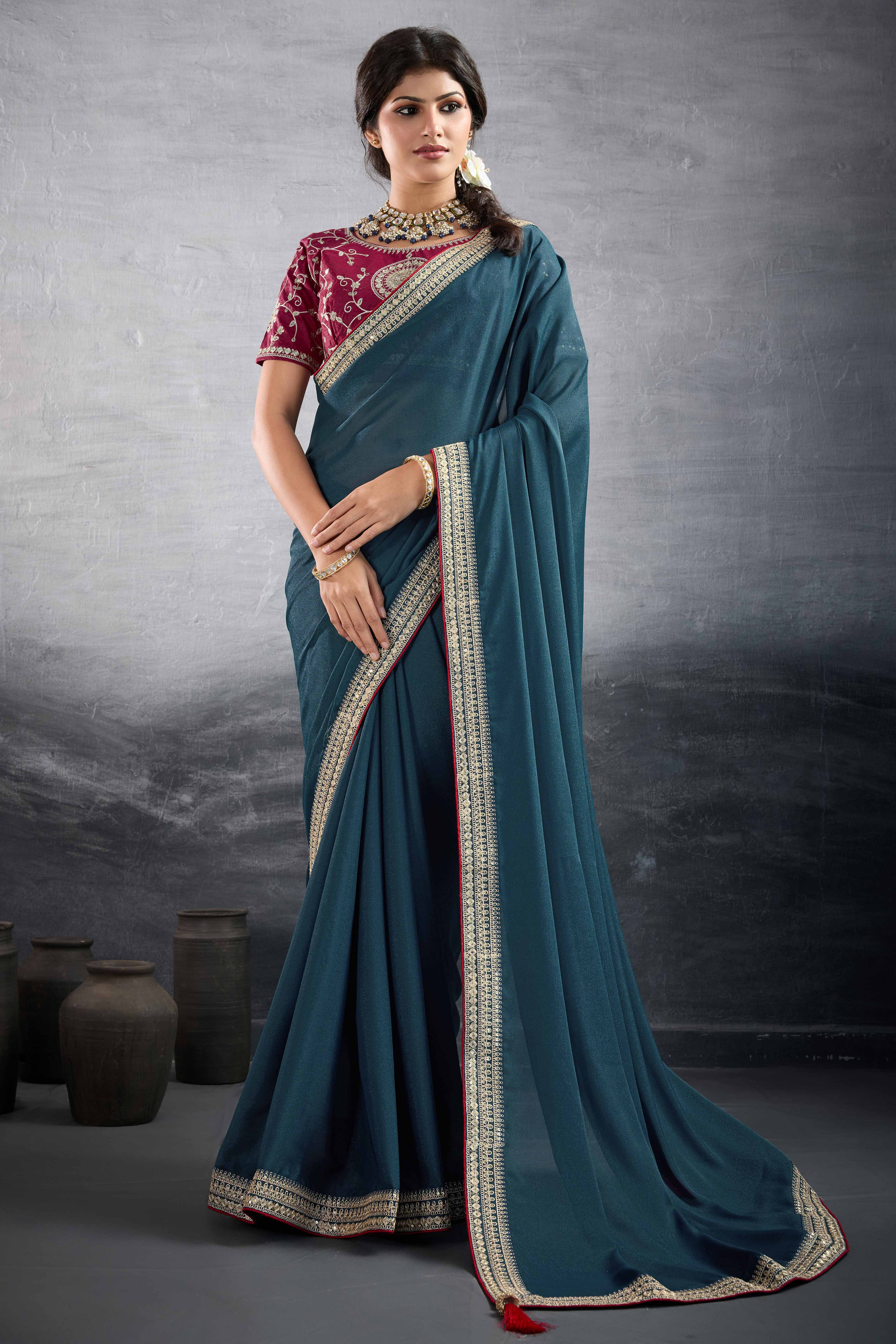 Teal Solid Saree In Georgette With Zari & Sequins Embroidery Border