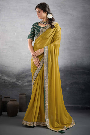 Mustard Solid Saree In Georgette With Zari & Sequins Embroidery Border
