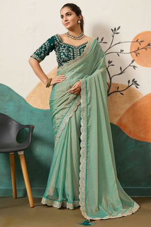 Sophisticated Sea Green Solid Moss Orgnaza Saree With Intricate Cording Sequins Embroidery Border