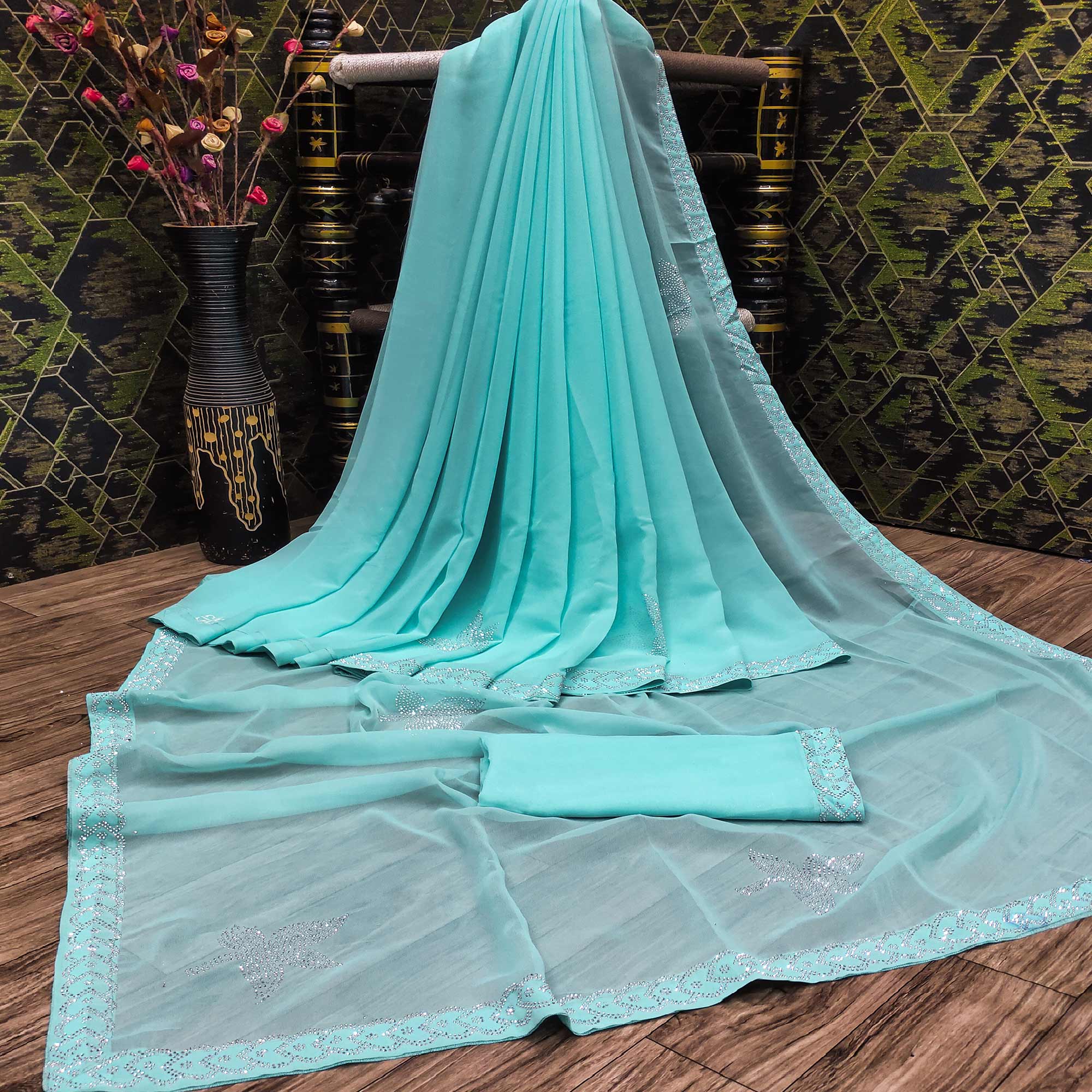 Turquoise Floral Swarovski Work Georgette Saree