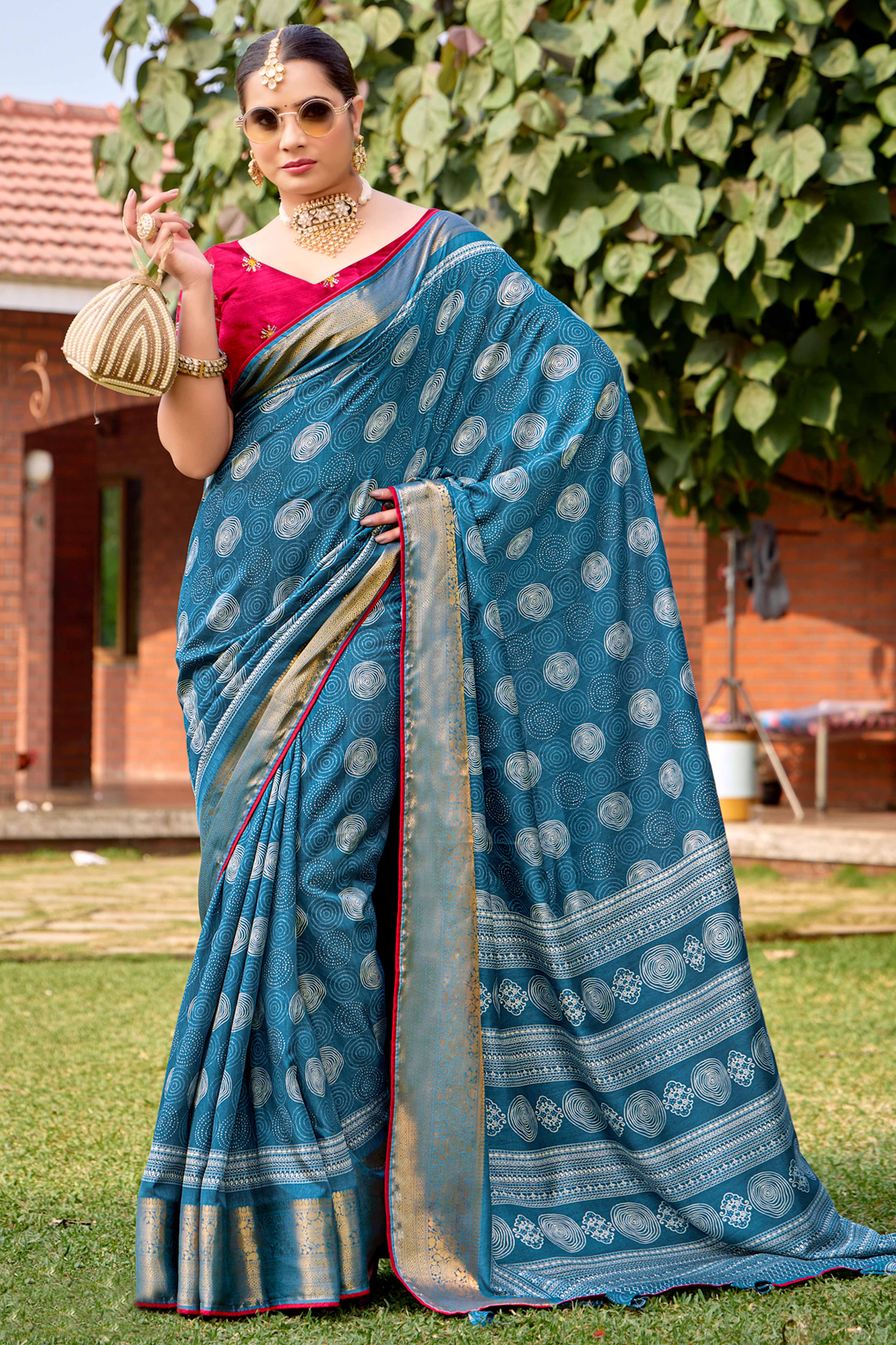 Blue Printed Dola Silk Saree With Ornate Zari Border & Tassel Pallu