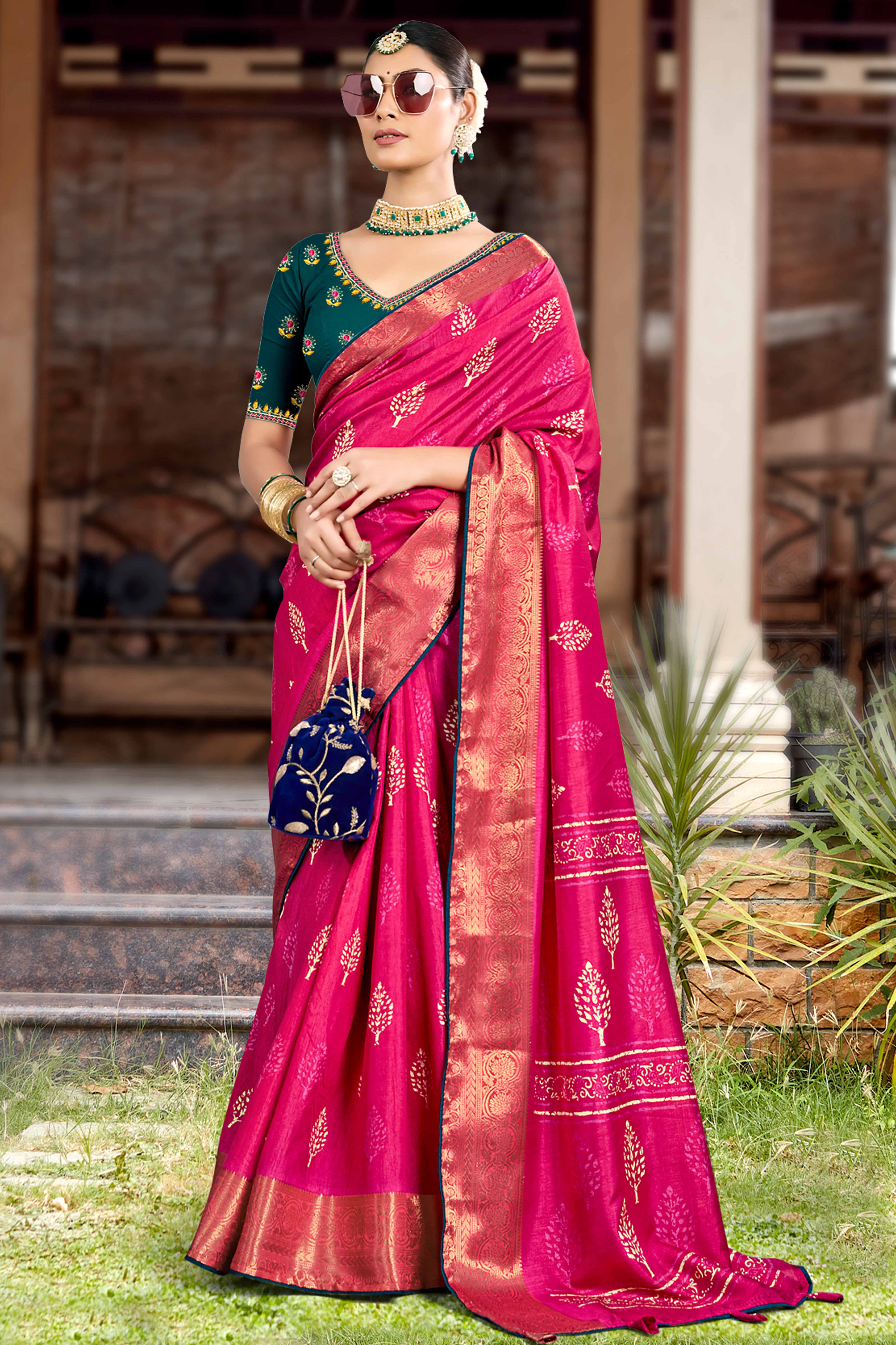 Rani Pink Dola Silk Saree Featuring Artistic Print Work & Graceful Tassel Edging