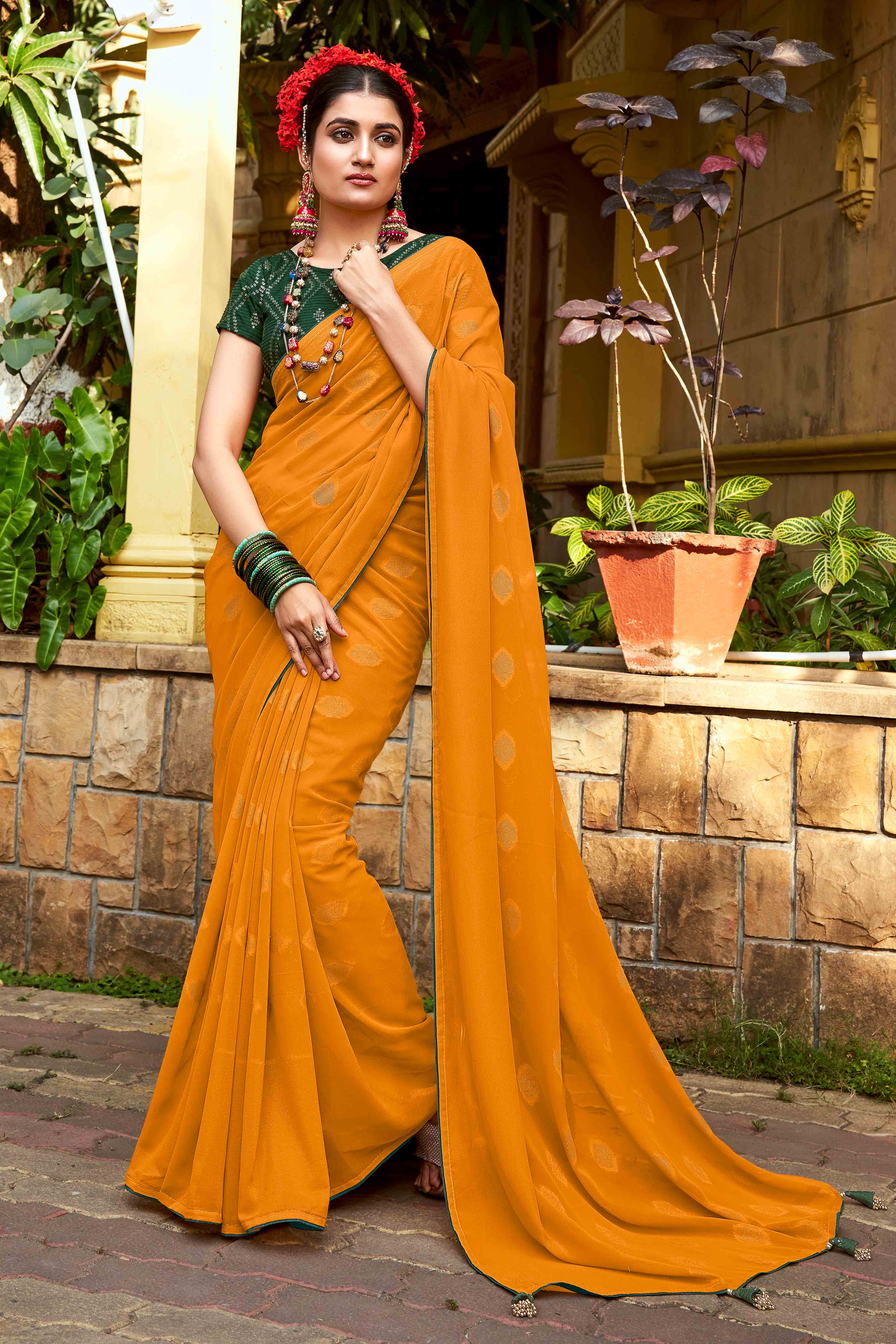 Mustard Woven Georgette Saree With Tassels