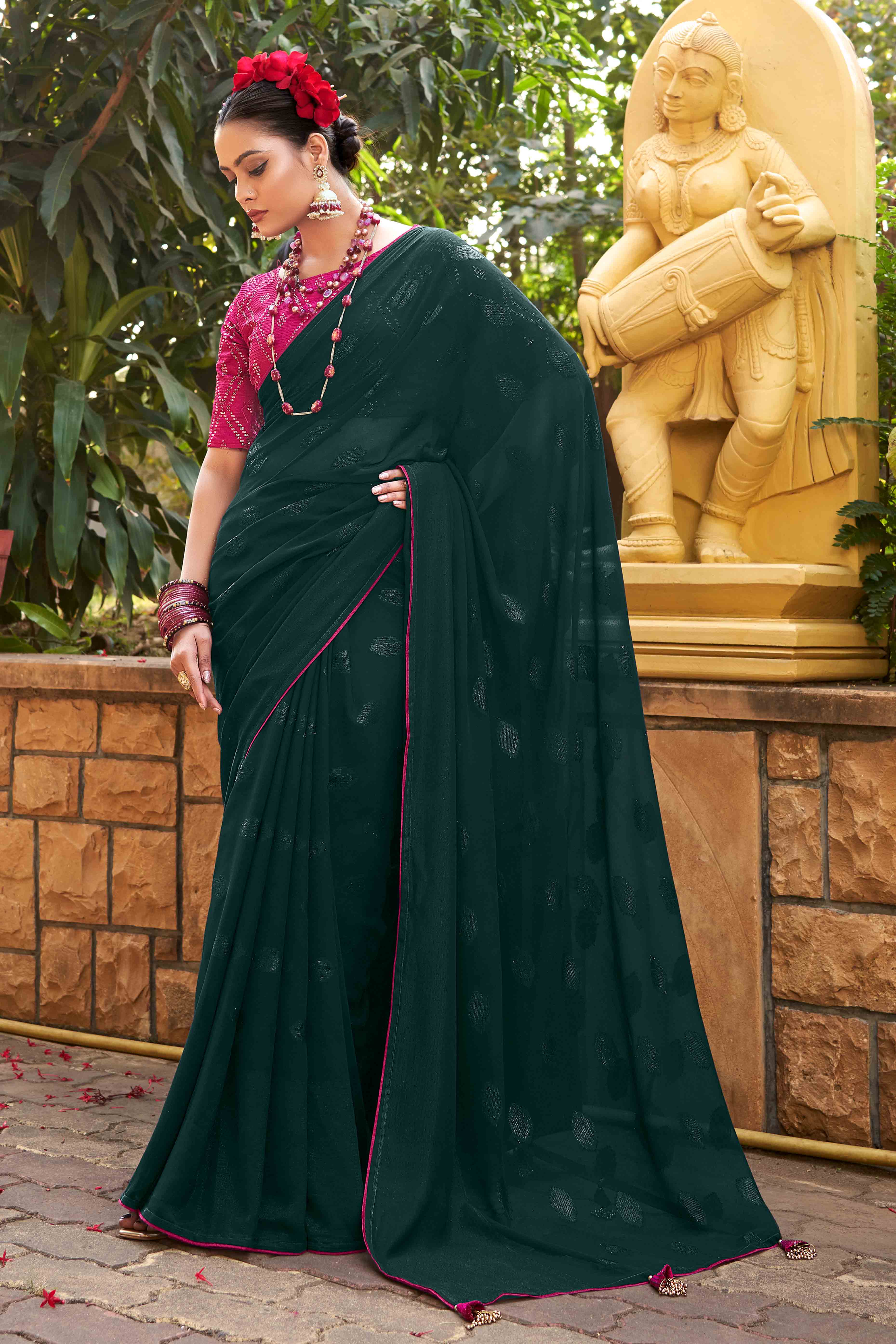 Deep Sea Green Woven Georgette Saree With Tassels