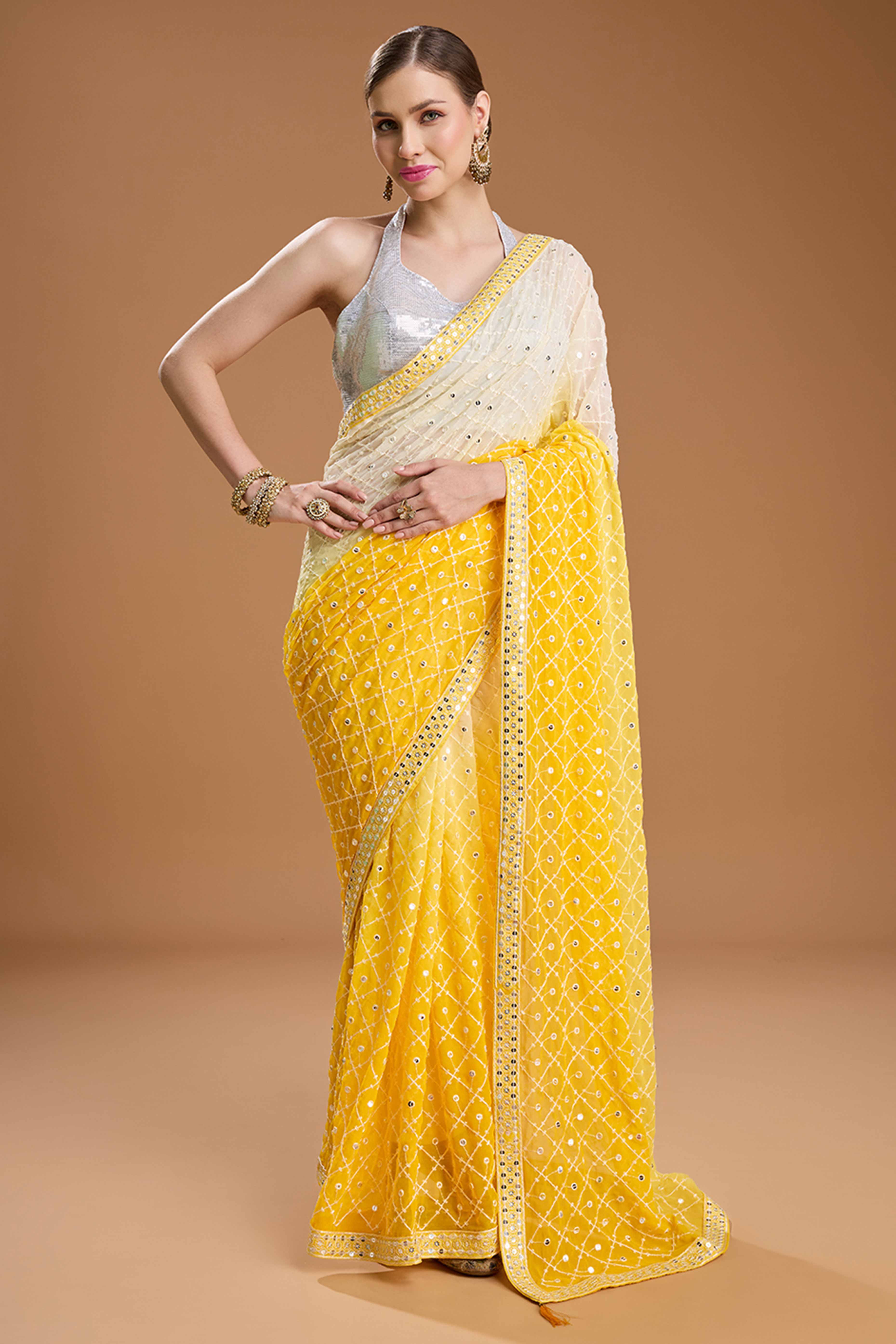 Yellow Georgette Saree Enhanced with Elegant Sequins Embellishments