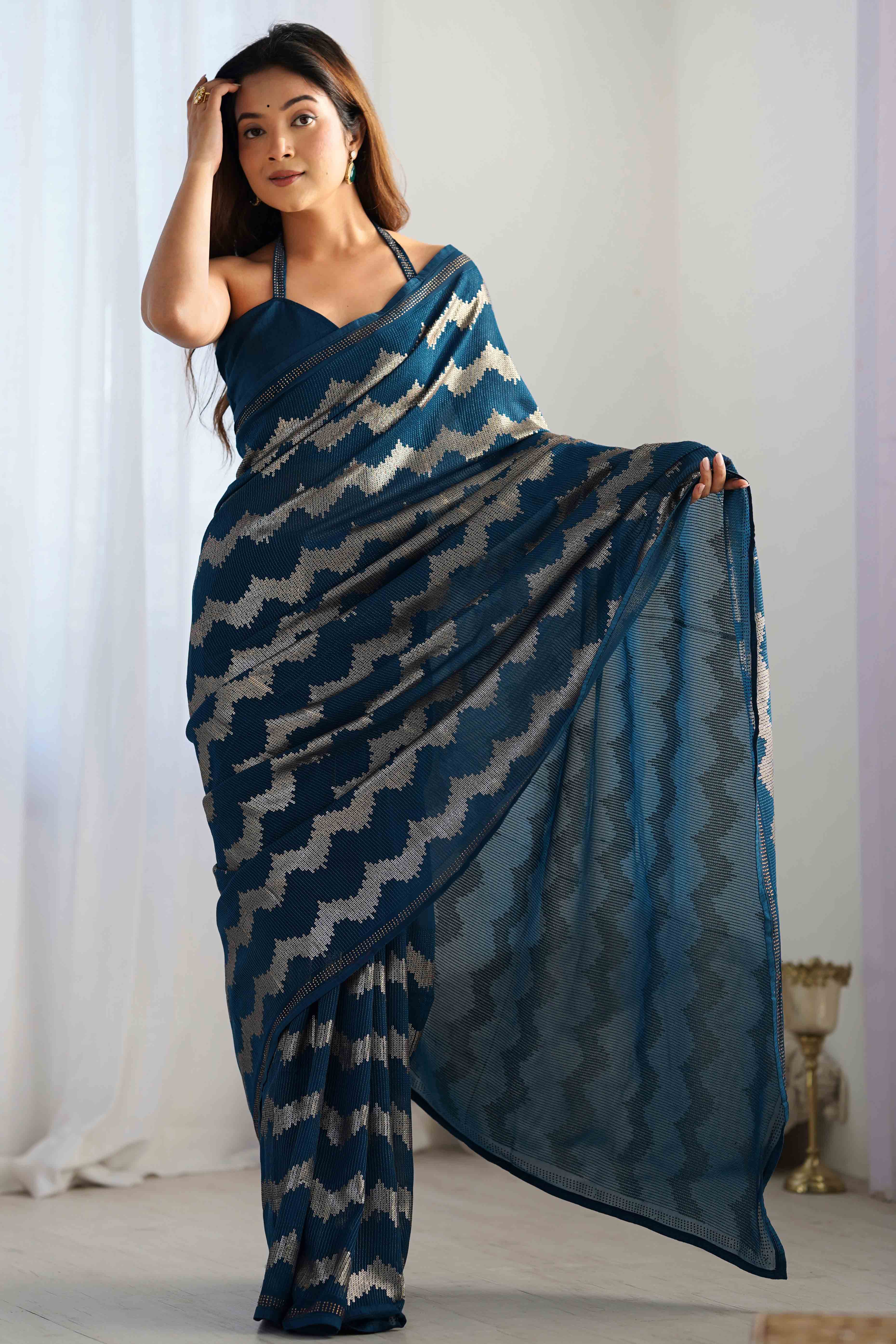 Teal Sequins Embroidered Georgette Saree