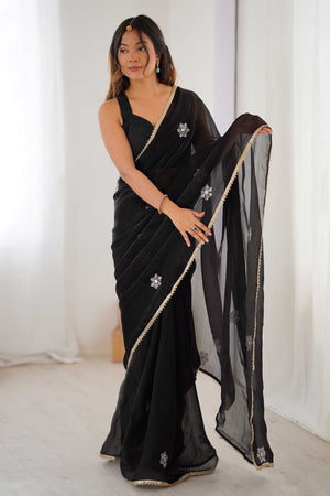 Black Organza Saree Embellished with Intricate Floral Work and Elegant Lace Detailing