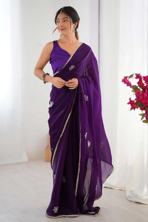Deep Purple Organza Saree Embellished with Intricate Floral Work and Elegant Lace Detailing