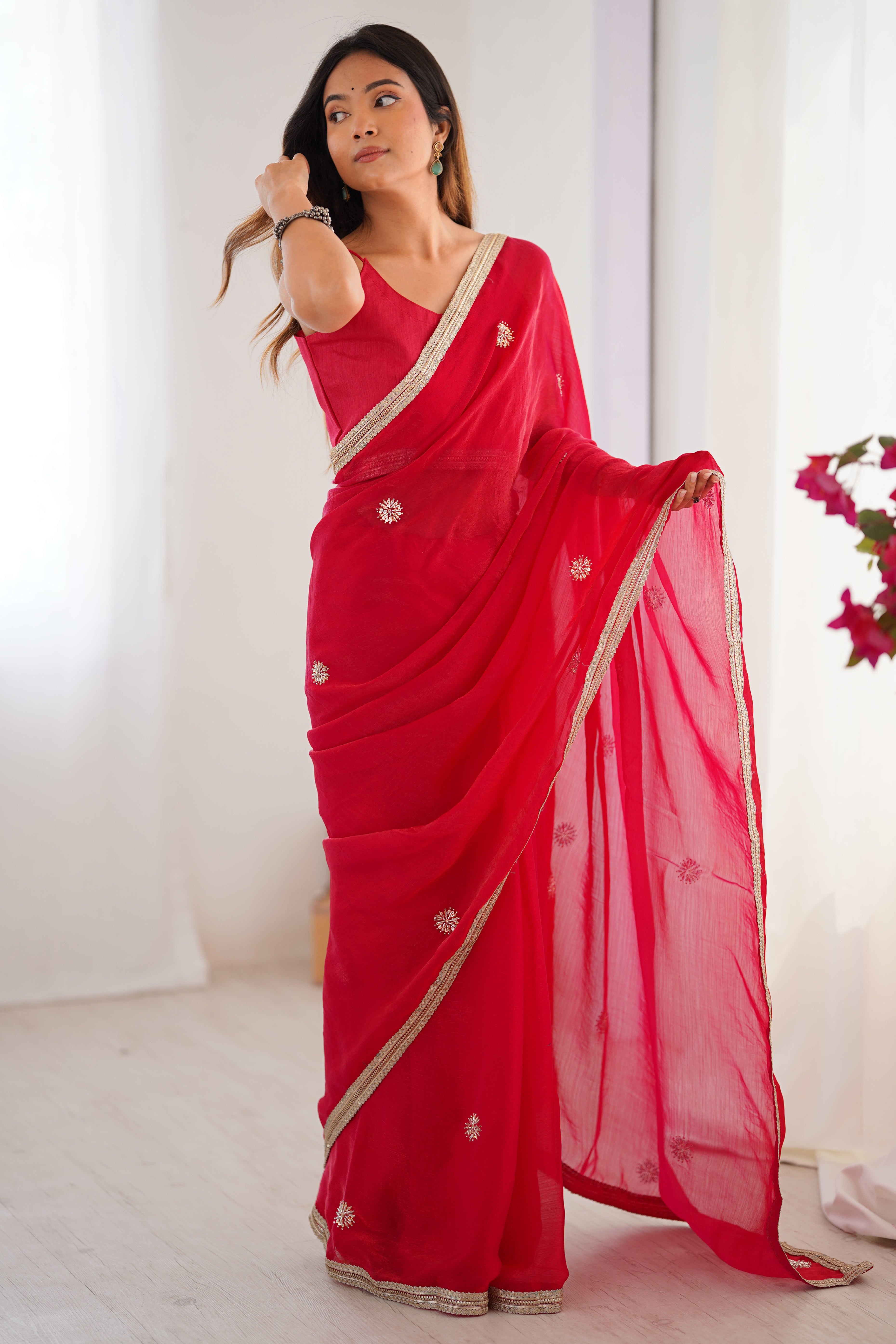 Elegant Red Organza Saree with Delicate Floral Embellishments and Lace Border