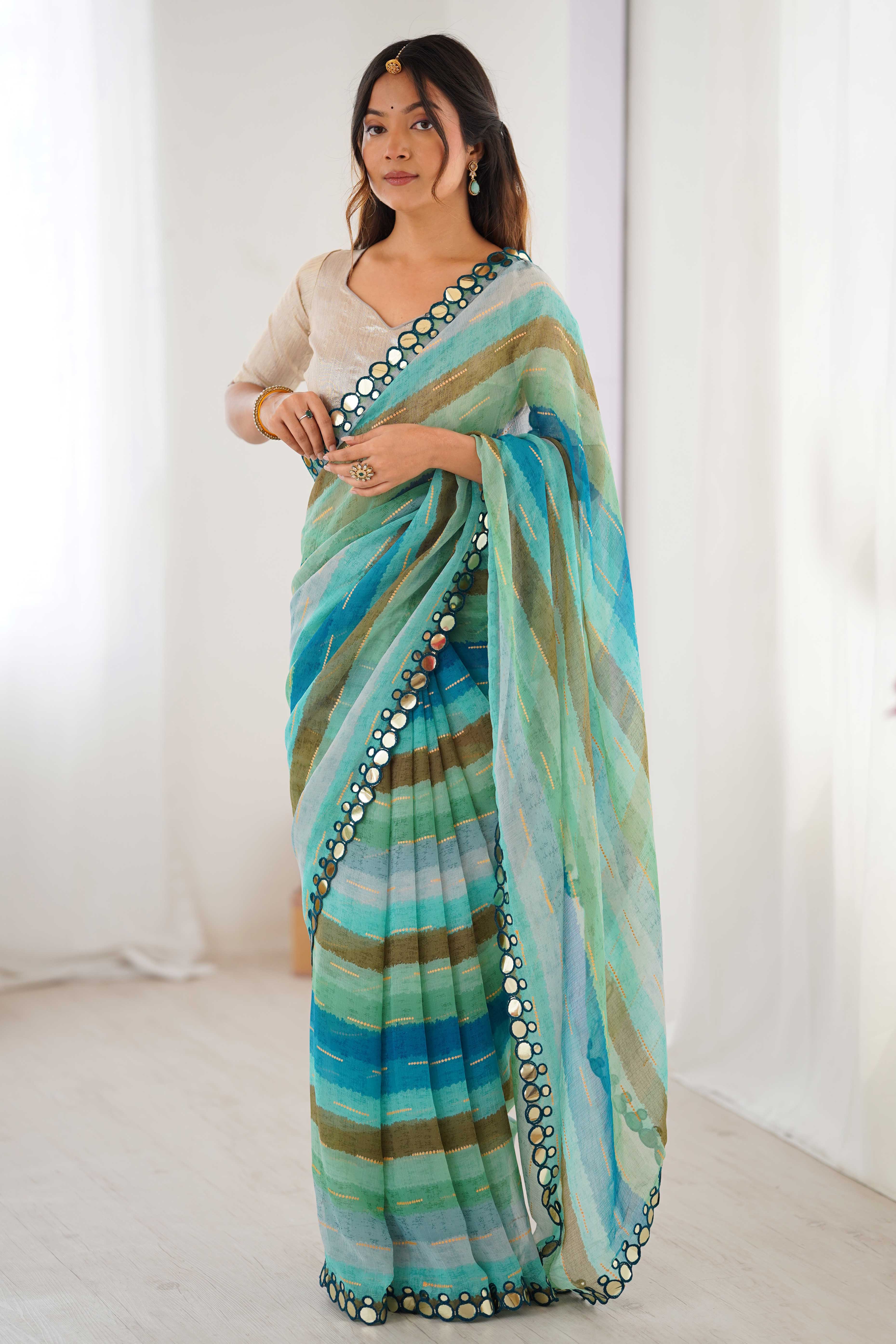 Soft Chiffon Turquoise Saree Featuring Classic Leheriya and Mirror Work Edges