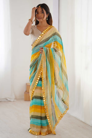 Soft Chiffon Yellow Saree Featuring Classic Leheriya and Mirror Work Edges