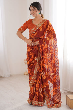 Elegant Rust Leaf & Floral Print Georgette Saree With Intricate Cording Sequins Embroidery Border