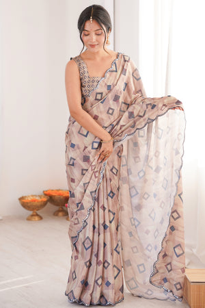 Elegant Cream Geometric Digital Printed Chinon Saree Accented With Intricate Embroidered Border