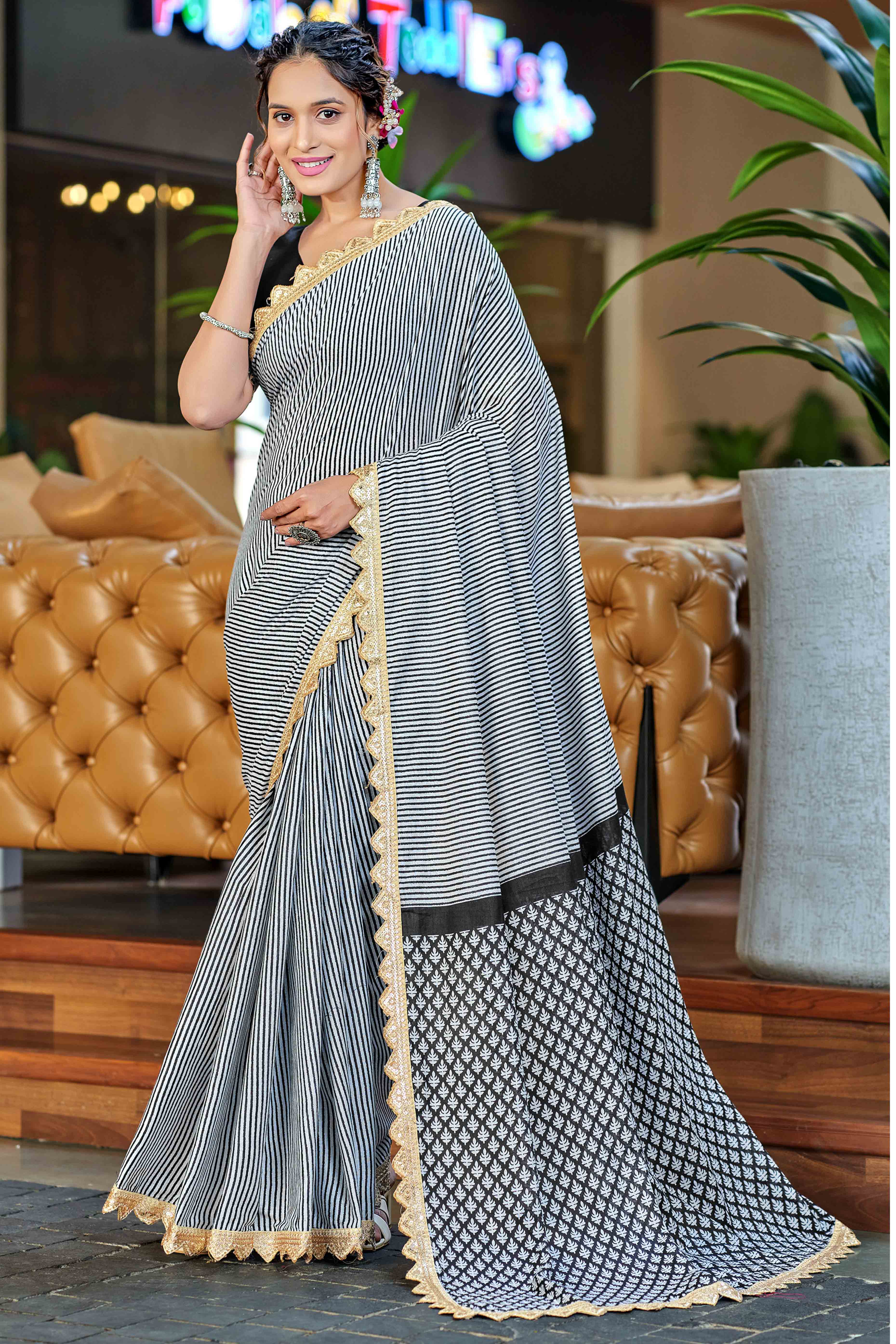 Office-Ready Black & White Mulmul Saree with Print and Embroidery Border