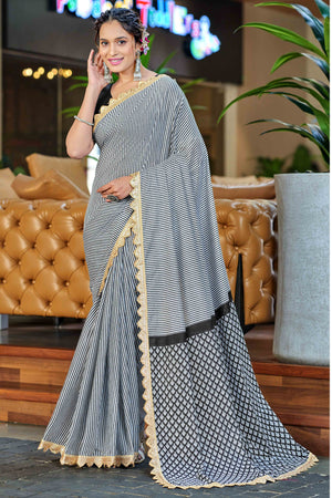 Office-Ready Black & White Mulmul Saree with Print and Embroidery Border