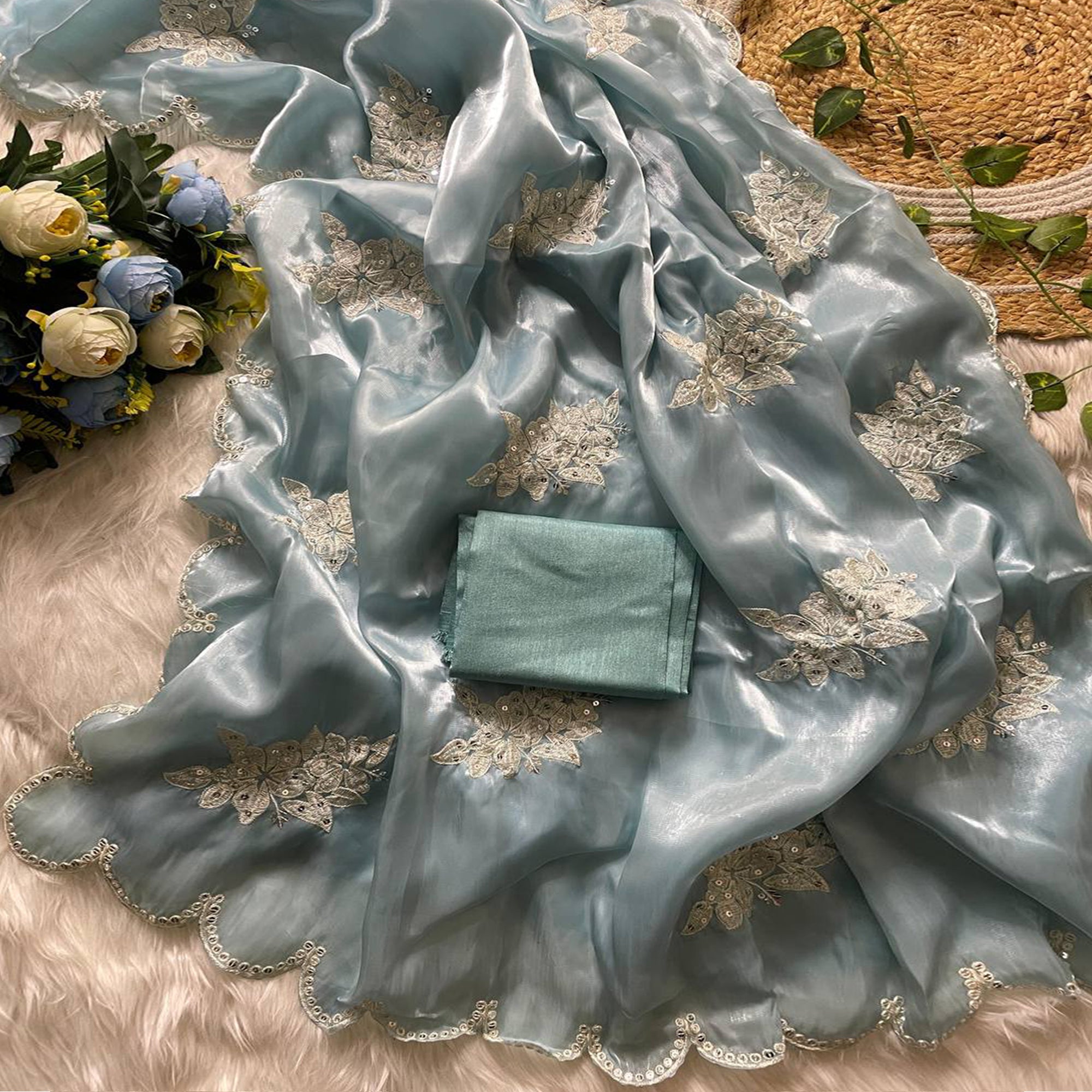 Captivating Sky Blue Floral Thread Embroidered Jimmy Choo Satin Saree With Gleaming Sequins Work