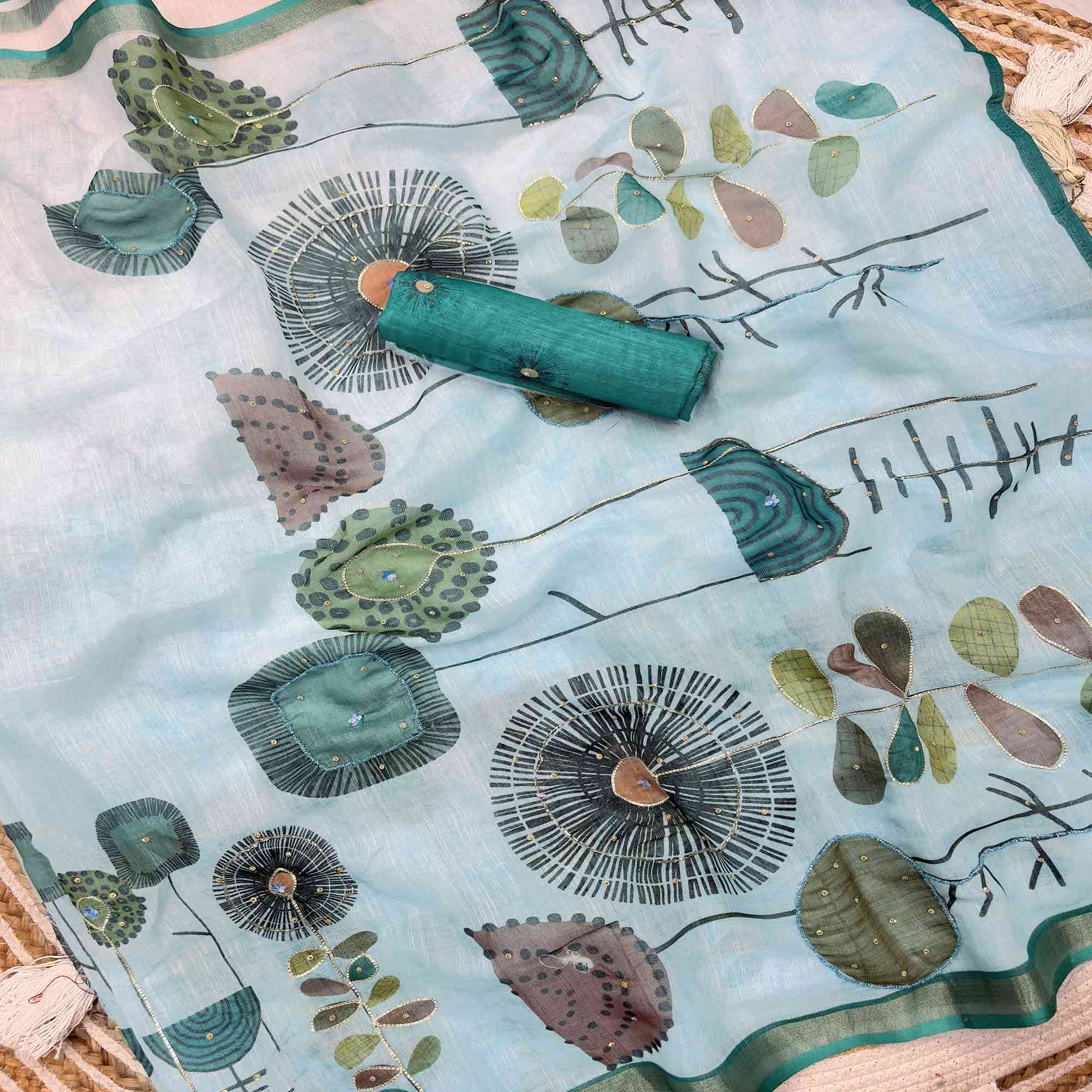 Sky Blue Pure Soft Linen Saree with Elegant Prints and Delicate Stone Work Embellishment