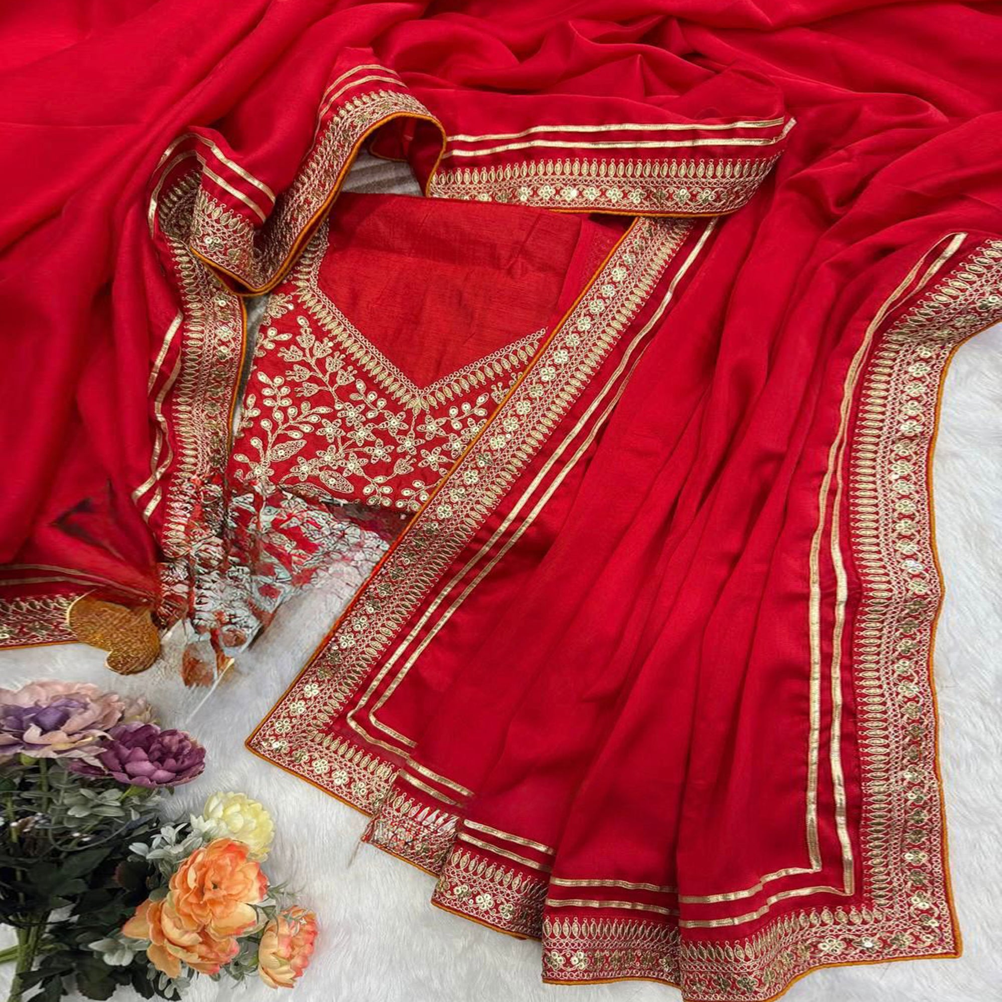 Red Festive Silk Blend Saree Highlighted with Silver Thread Work and Shimmering Sequins