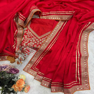 Red Festive Silk Blend Saree Highlighted with Silver Thread Work and Shimmering Sequins