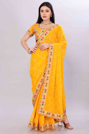 Yellow Bandhani Printed Georgette Saree Framed With Elegant Embroidered Border