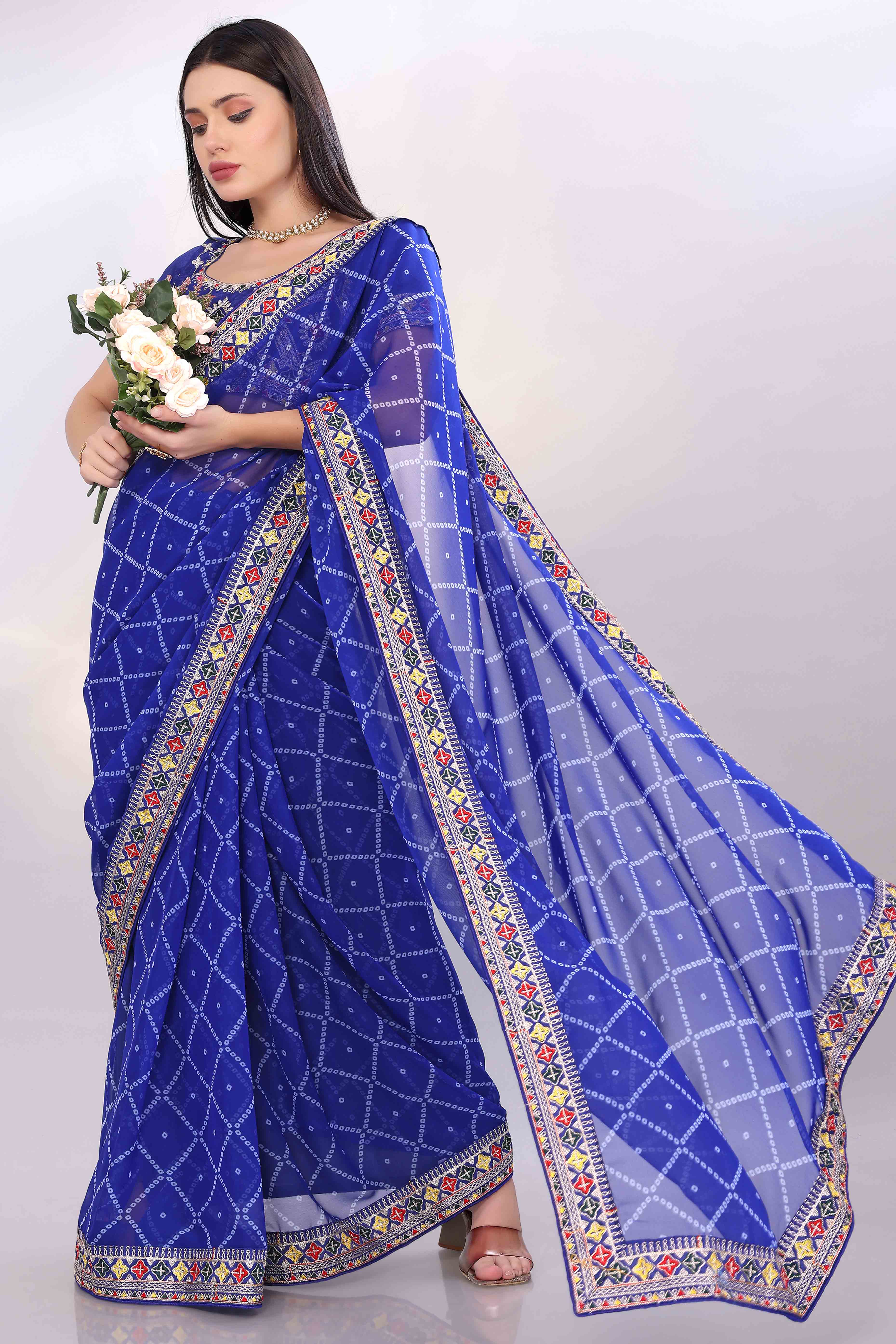 Blue Bandhani Printed Georgette Saree Framed With Elegant Embroidered Border