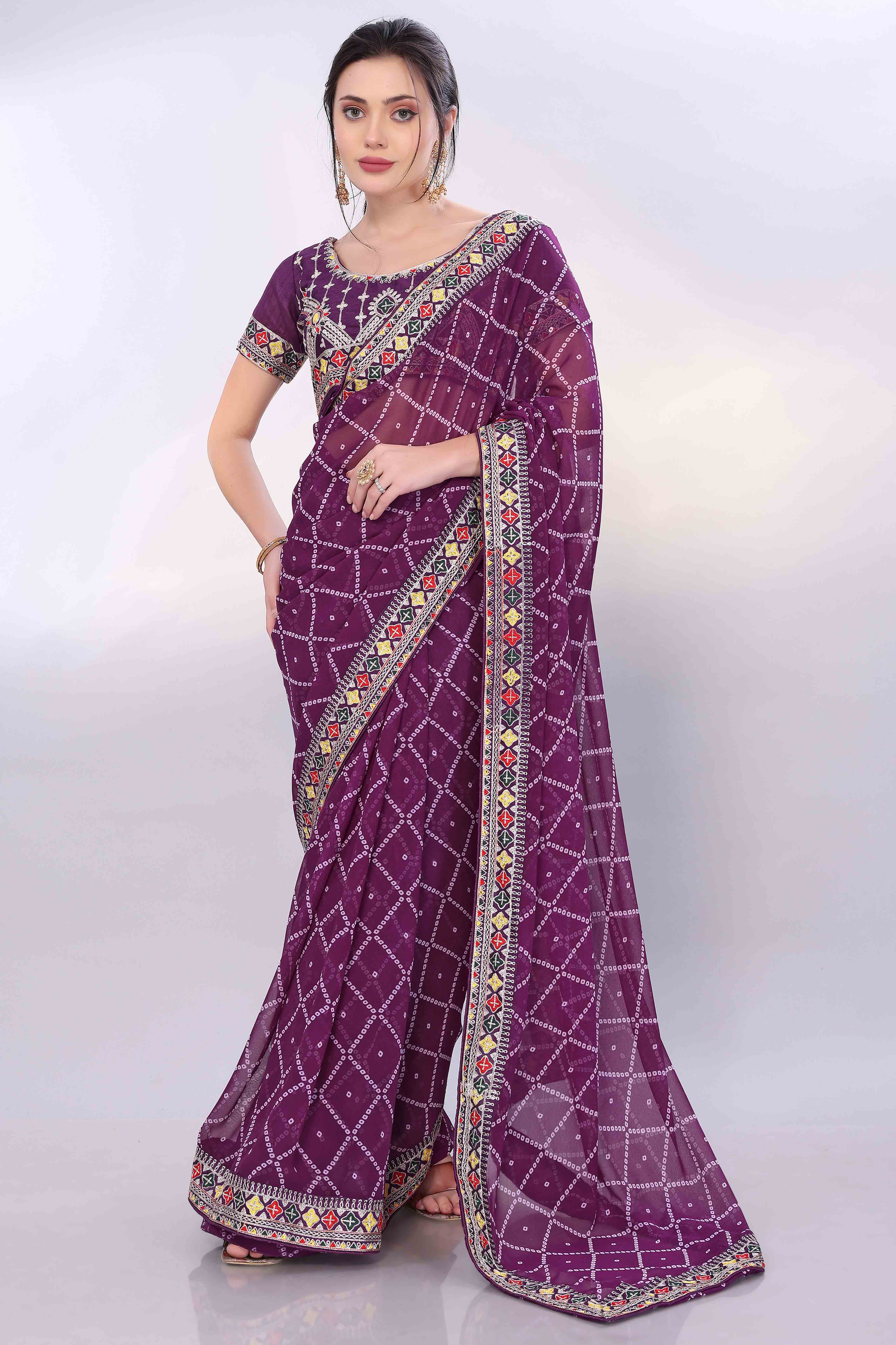 Wine Bandhani Printed Georgette Saree Framed With Elegant Embroidered Border