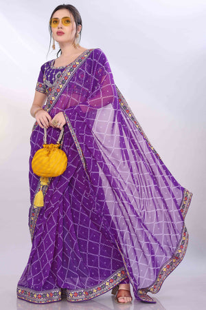 Purple Bandhani Printed Georgette Saree Framed With Elegant Embroidered Border